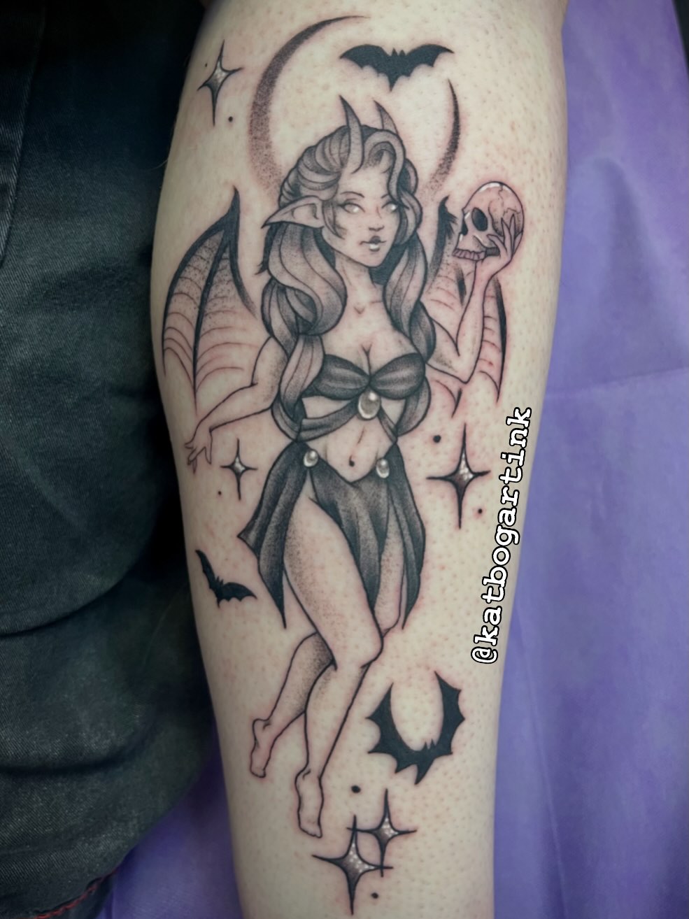 Elfine woman with wings black and grey tattoo on the forearm by Kat (Scout) Bogart