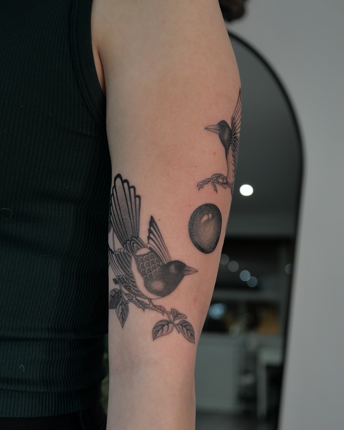 Bird and moon black and grey tattoo on the forearm by zak brochu, Windsor, Ontario