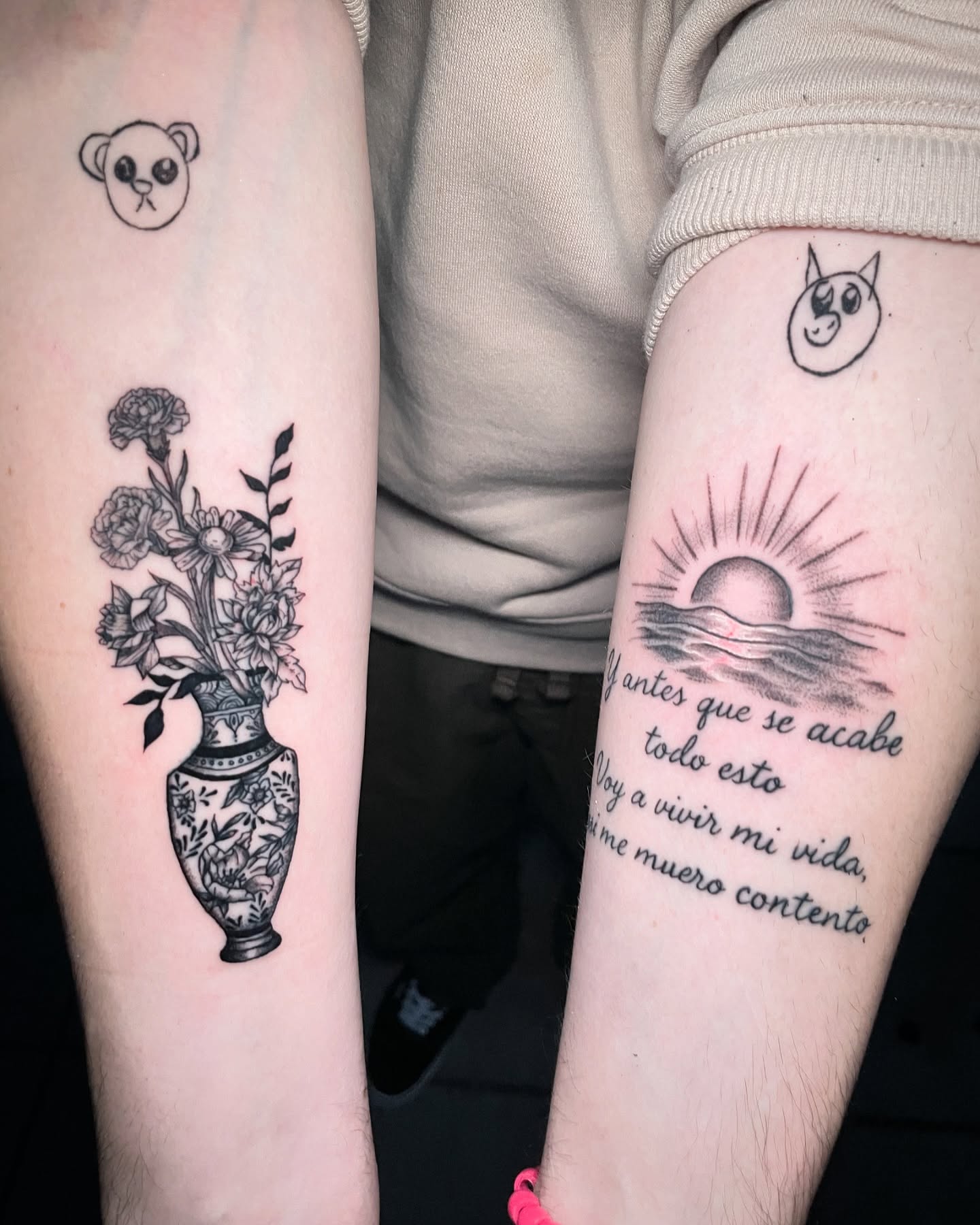 Flowers in vase black and grey tattoo on the forearm by Chato
