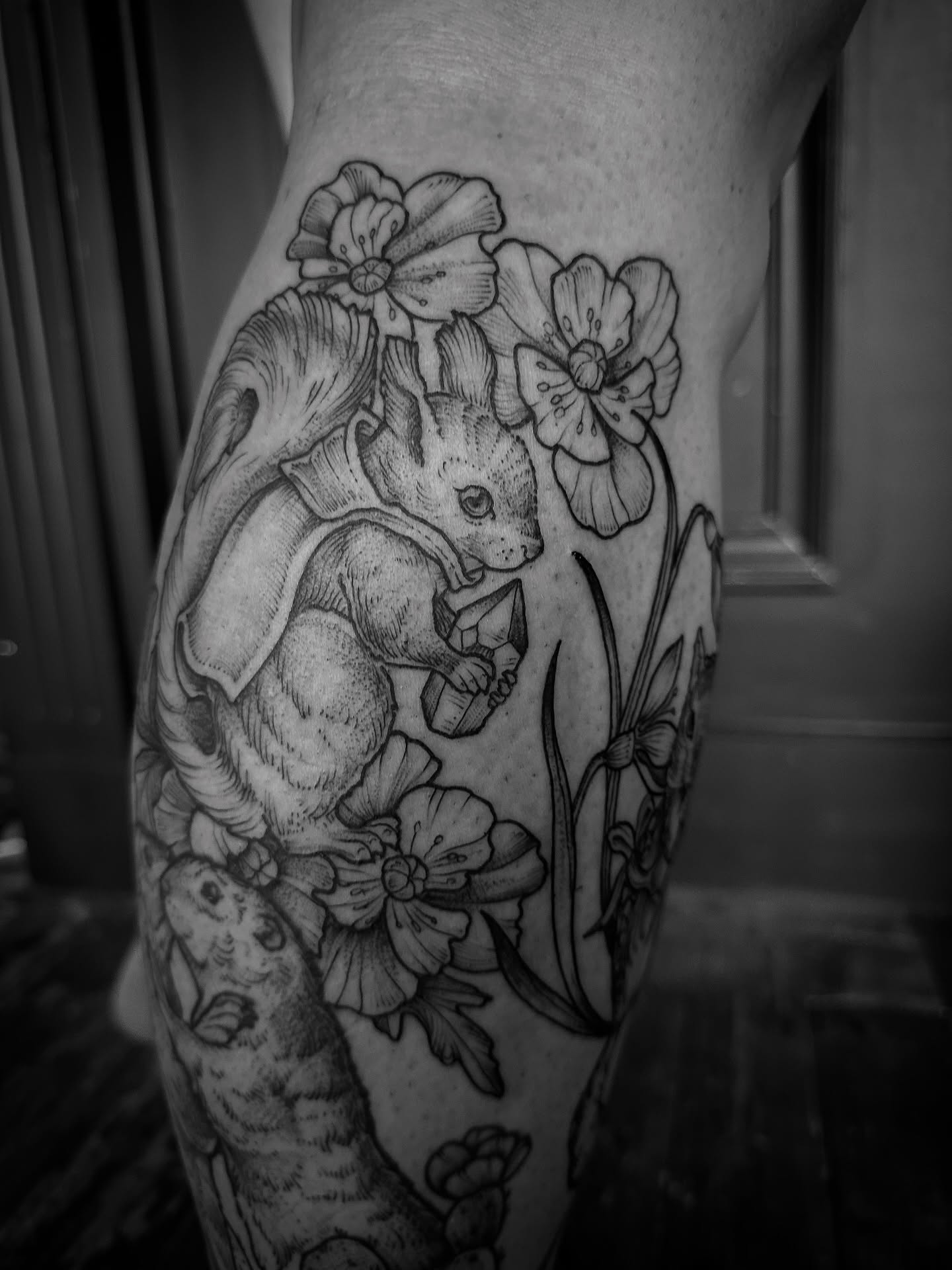 Squirrel and flowers realism tattoo on the forearm by Desireé Keys, Midvale, Utah