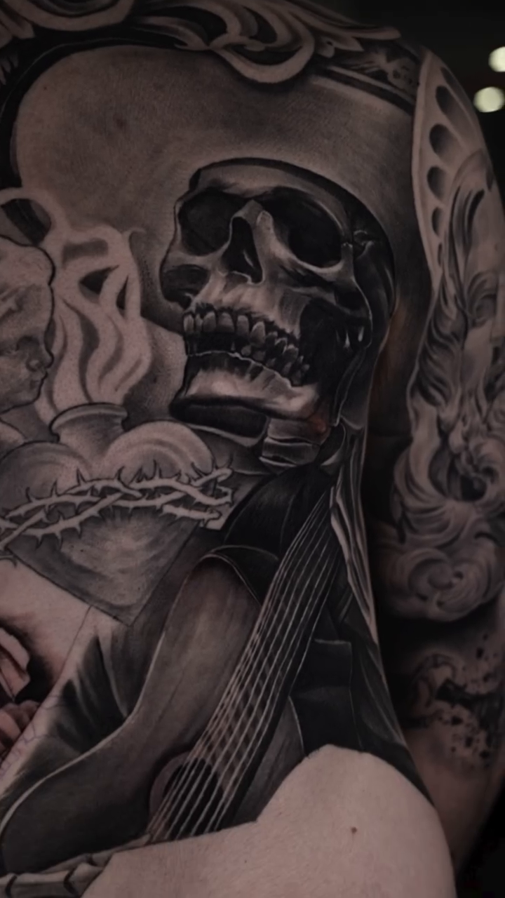 Tattoo by @lys__ink — dark_realism, black_and_grey