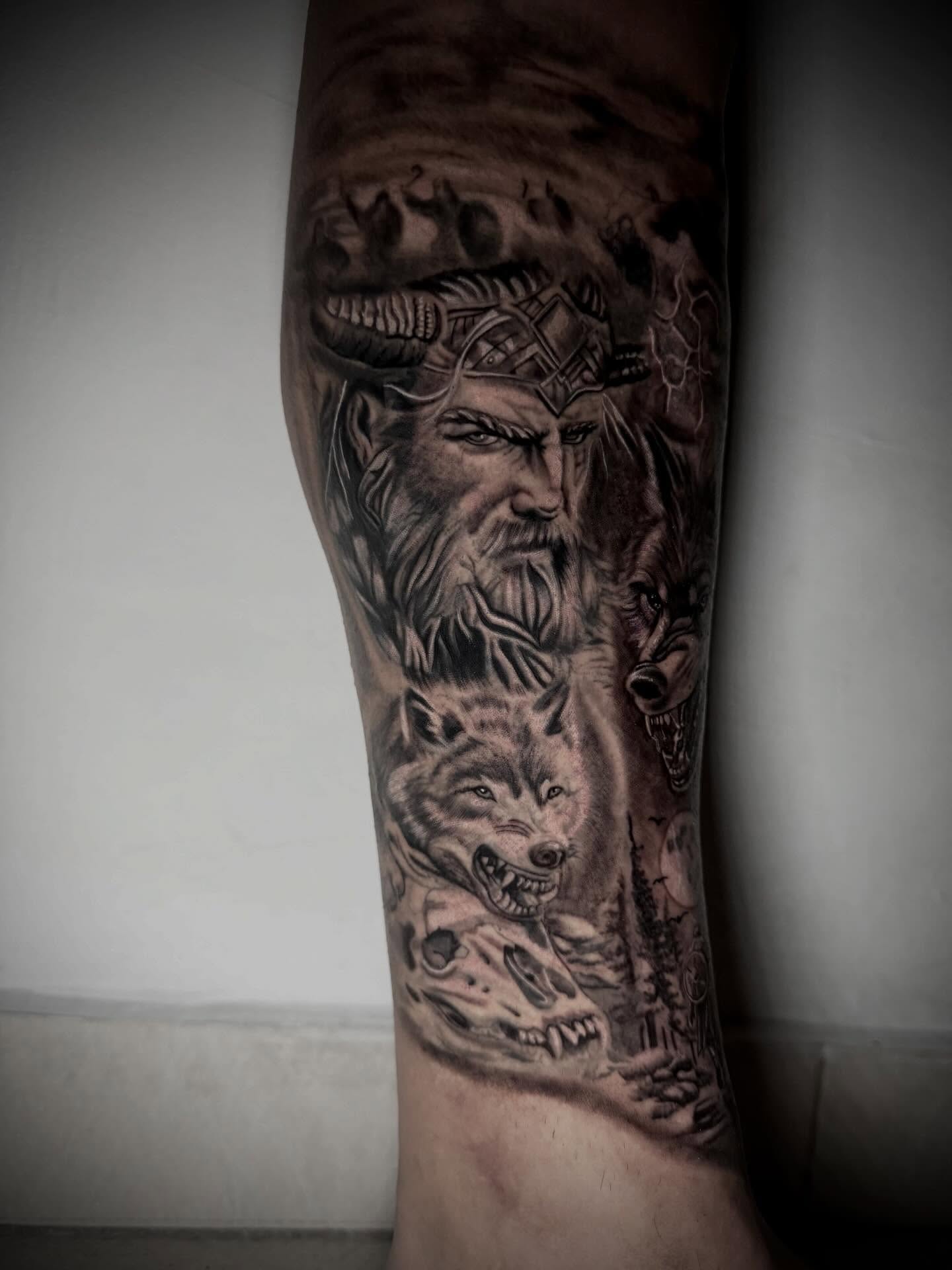 Viking warrior and wolf realism tattoo on the forearm by Daniel Ruiz
