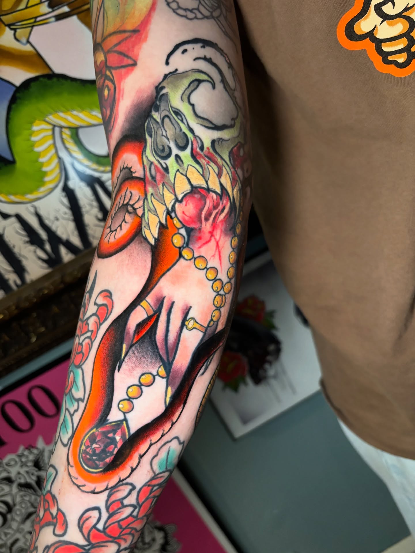 Skull and snake American traditional tattoo on the forearm by Matt Stolzenburg