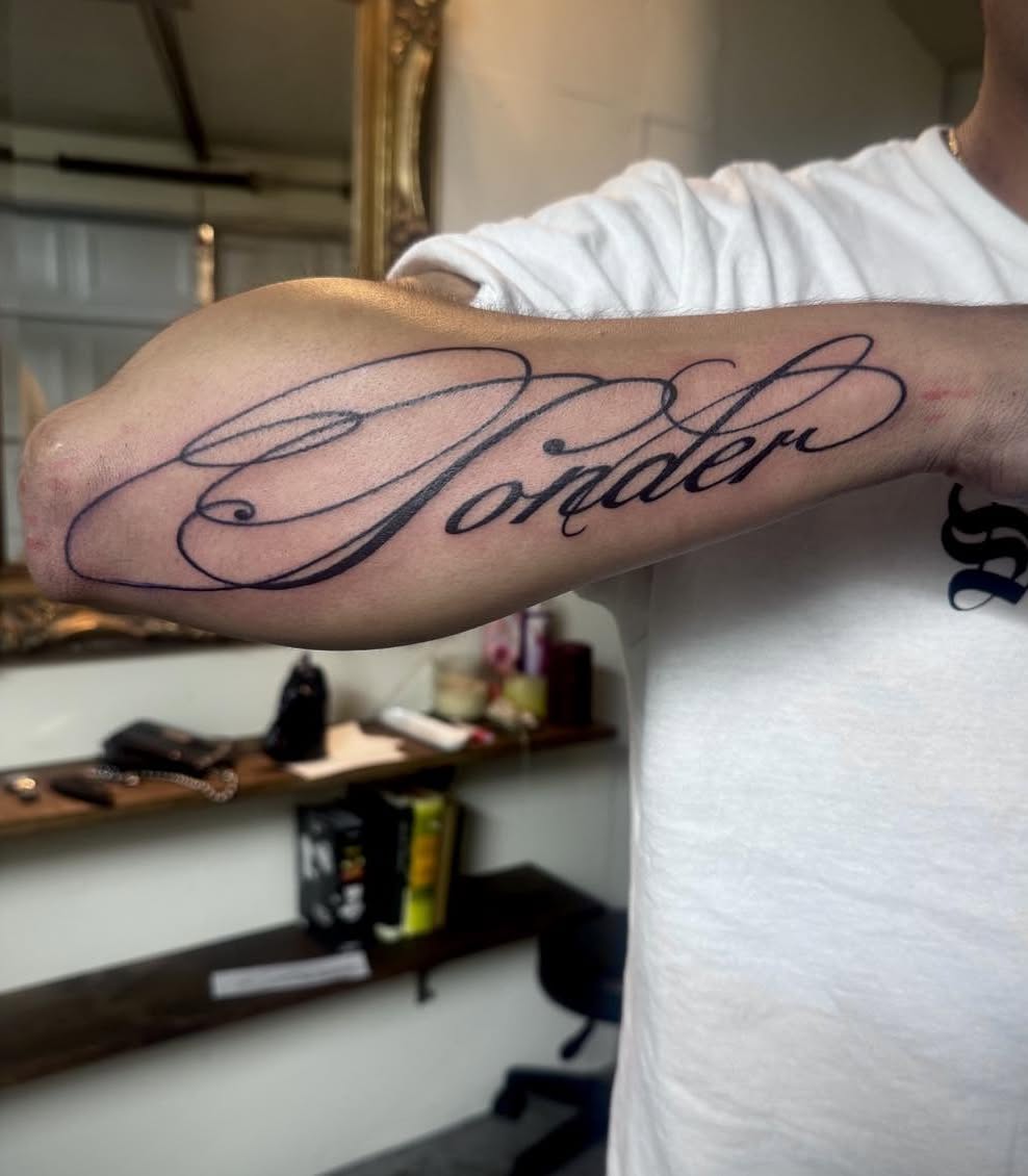 Script lettering lettering script tattoo on the forearm by Quin Walker
