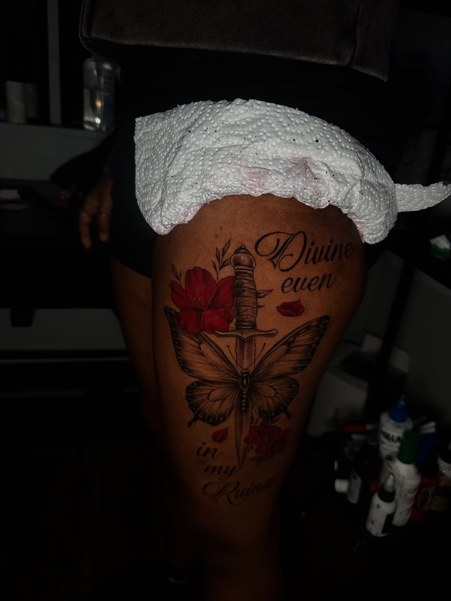 Butterfly and dagger realism tattoo on the thigh by Chris (Pikasso)