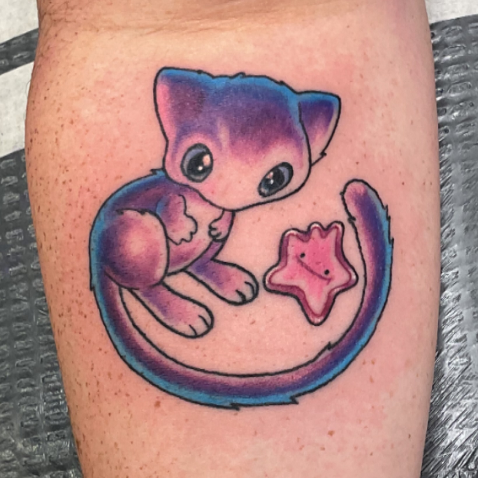Cat with star dotwork tattoo on the thigh by Roachrude