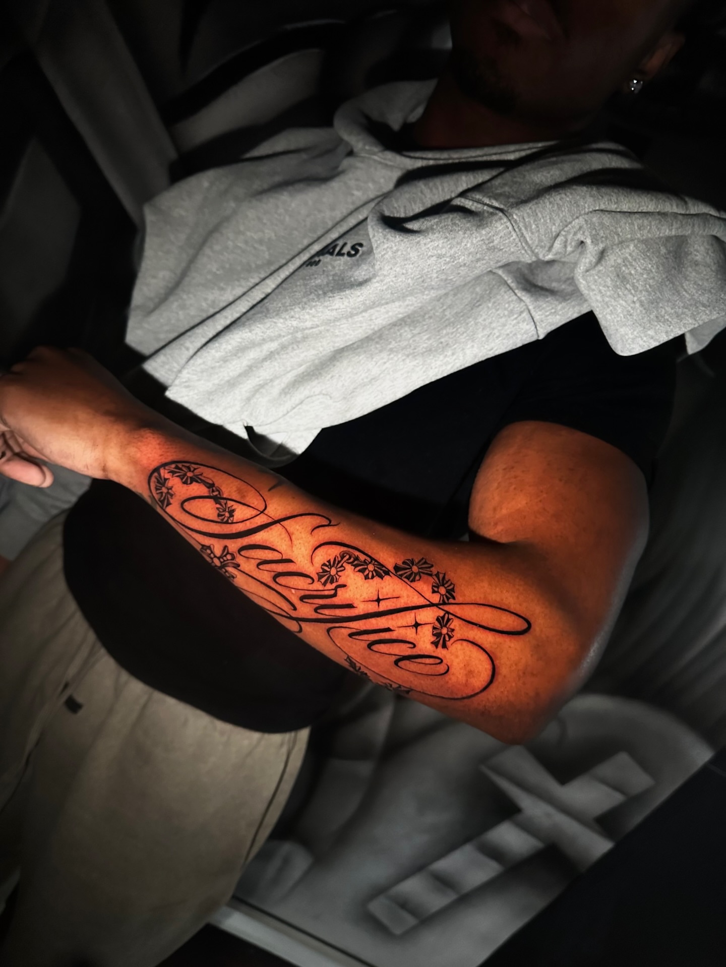 Script lettering lettering script tattoo on the forearm by Emma Sferdian🇷🇴