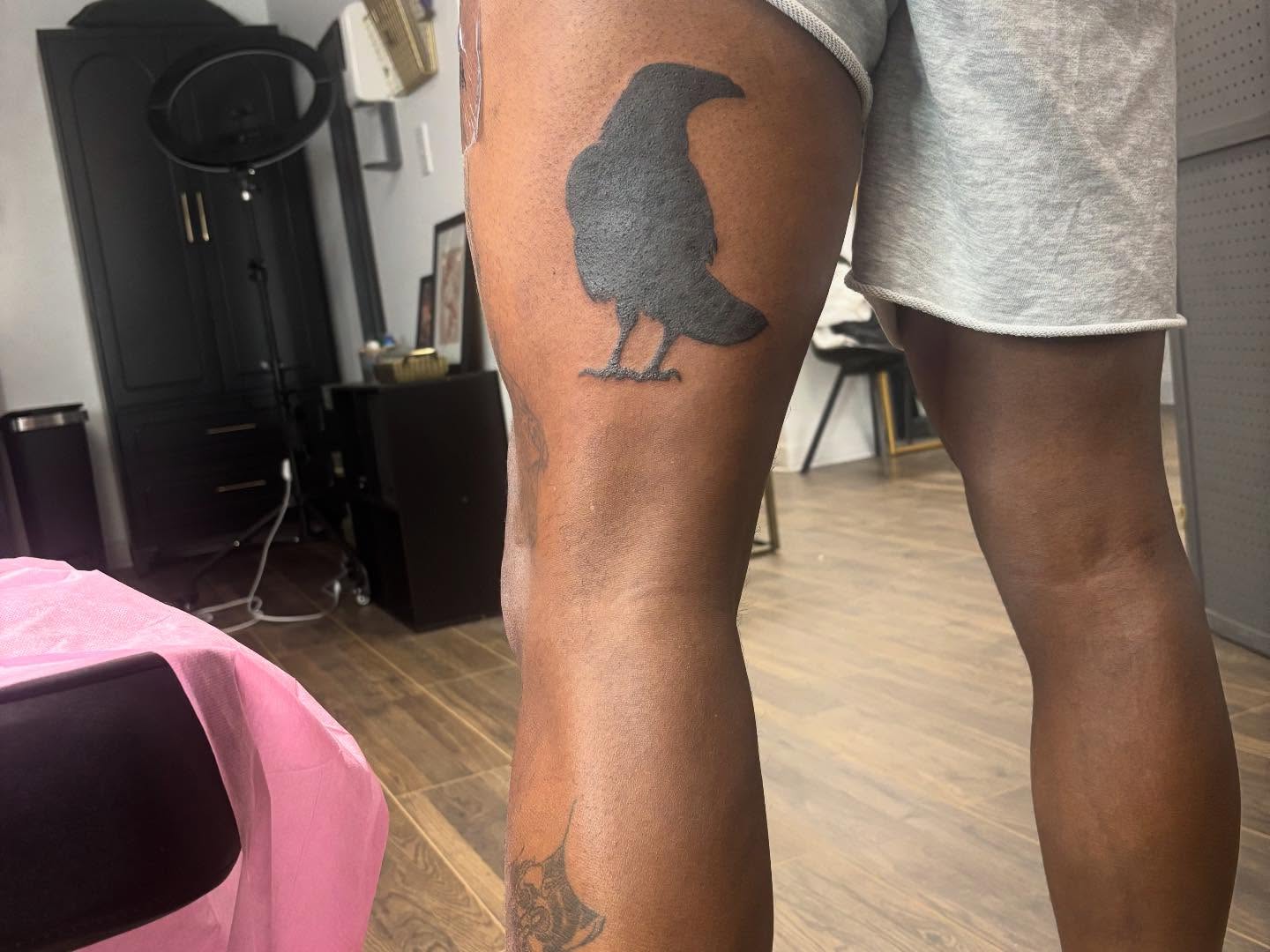 Crow black and grey tattoo on the leg by Mickey