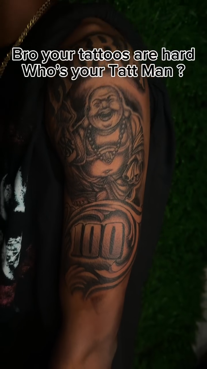 Buddha and money realism tattoo by Los Angeles Tattoo Artist
