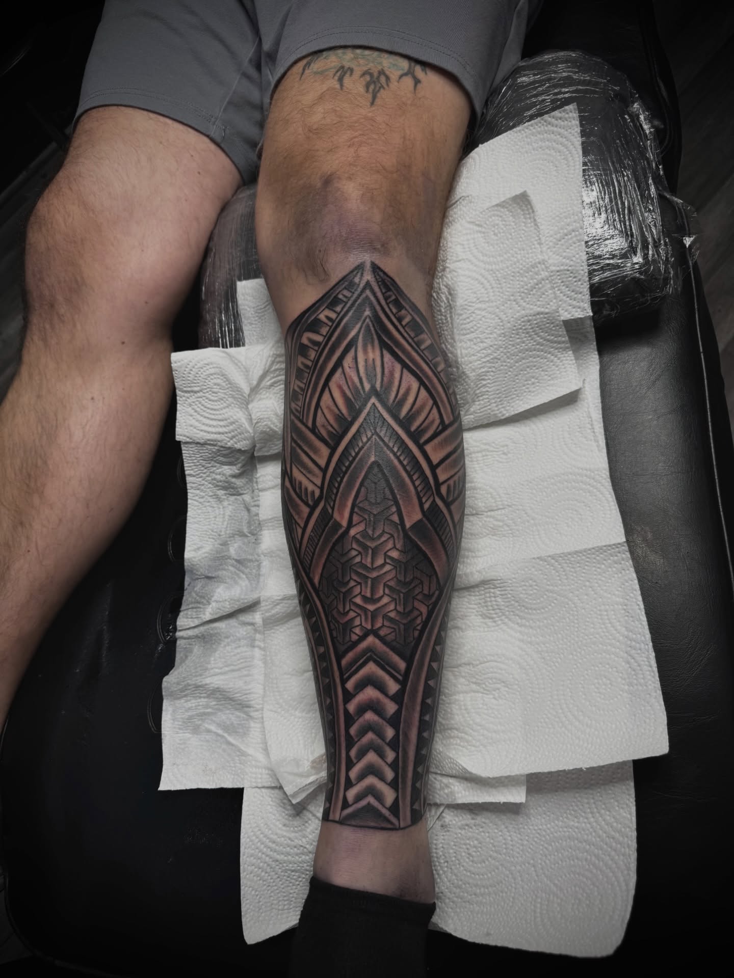 Geometric pattern geometric tattoo on the calf by Zeus