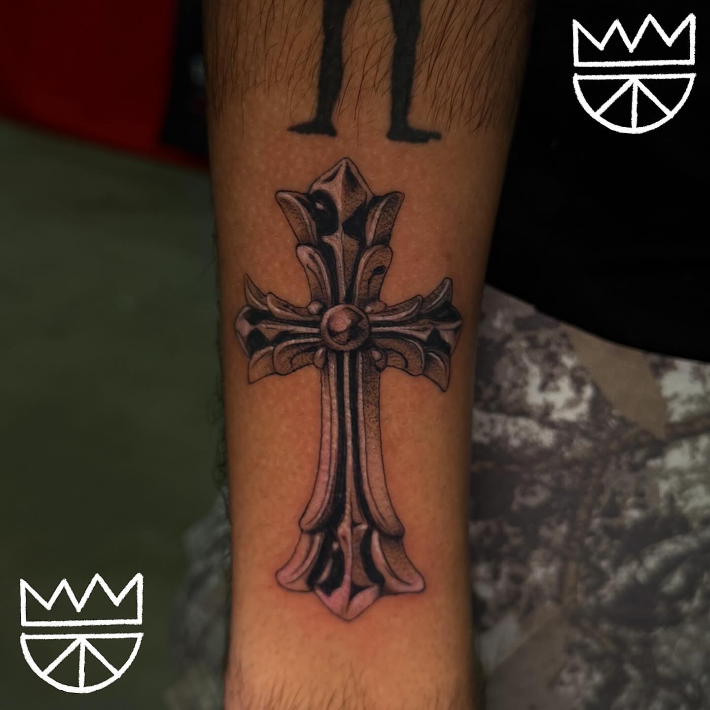 Cross black and grey tattoo on the forearm by Prncjordn, Stallings, North Carolina