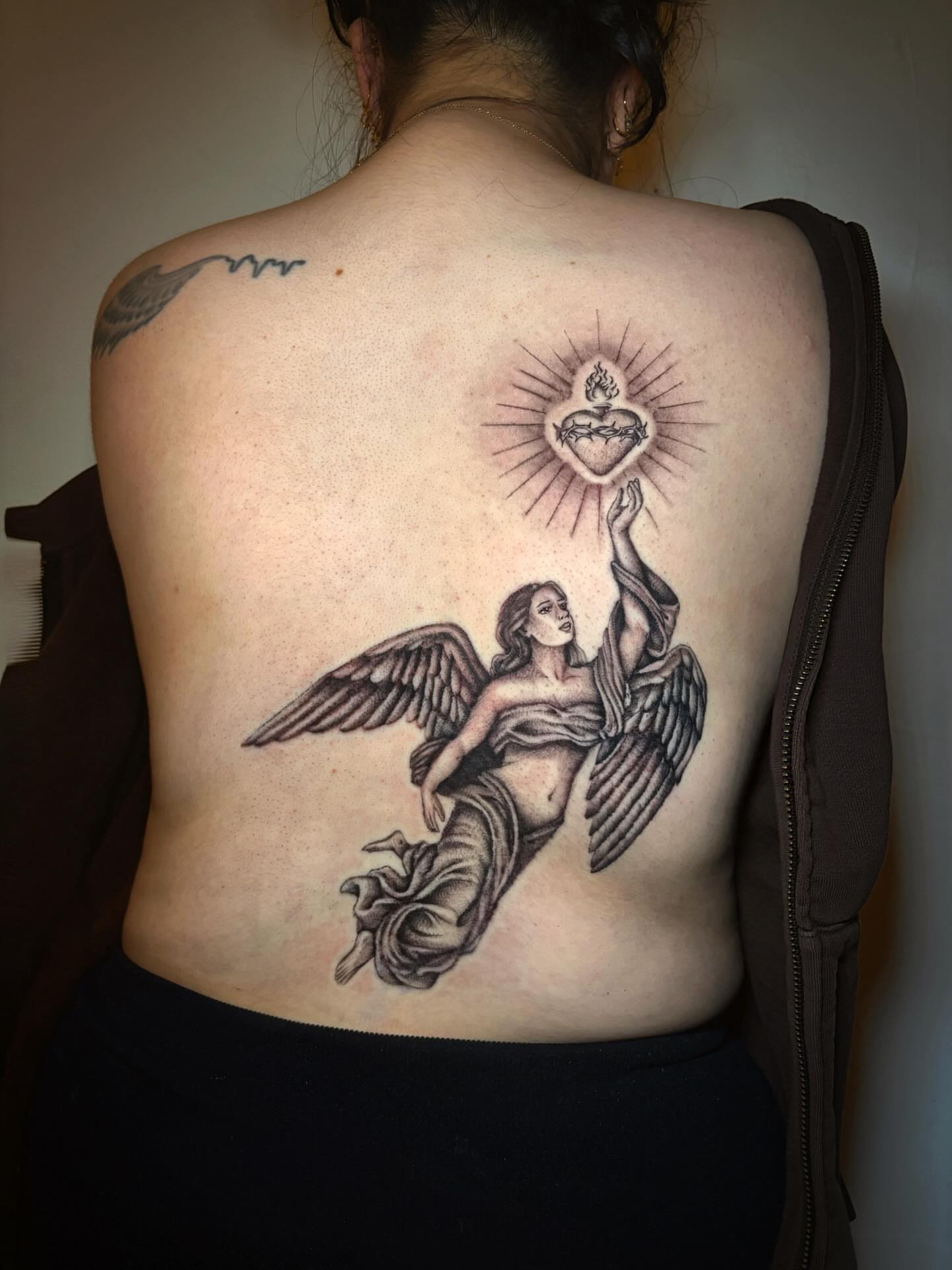 Angel with heart realism tattoo on the back by l i z ✶