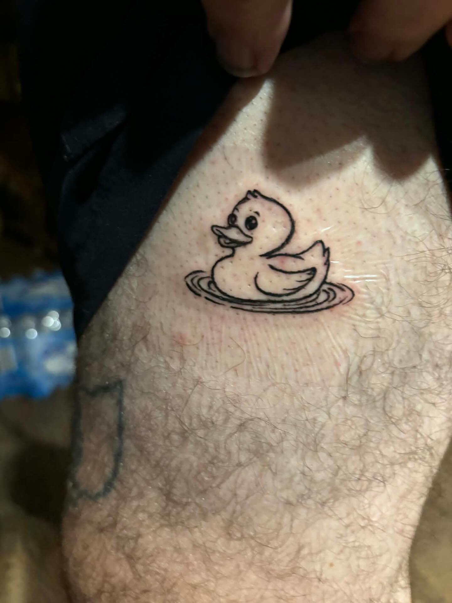 Rubber duck black and grey tattoo on the forearm by Madison