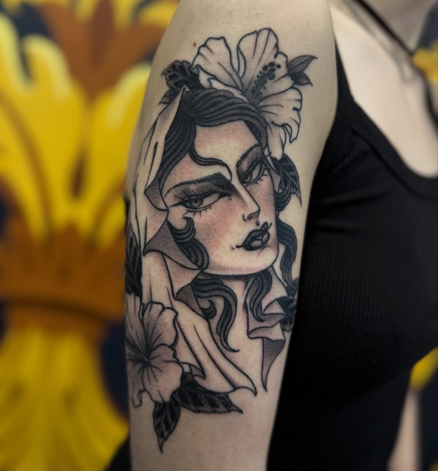 Woman with flowers realism tattoo on the forearm by Christopher  Cousins, Nashville, Tennessee