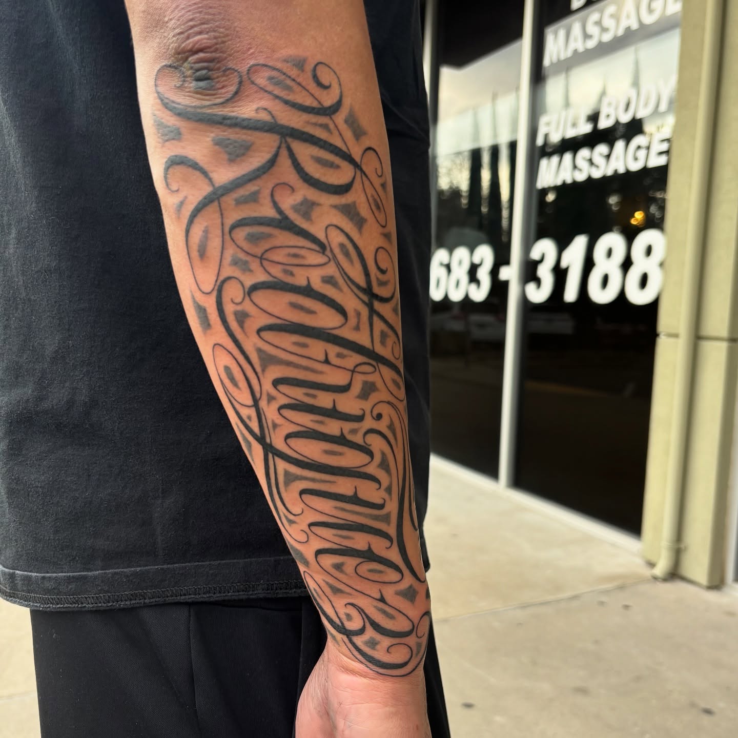 Script lettering lettering script tattoo on the forearm by Cristiano Ochoa, Elk Grove, California