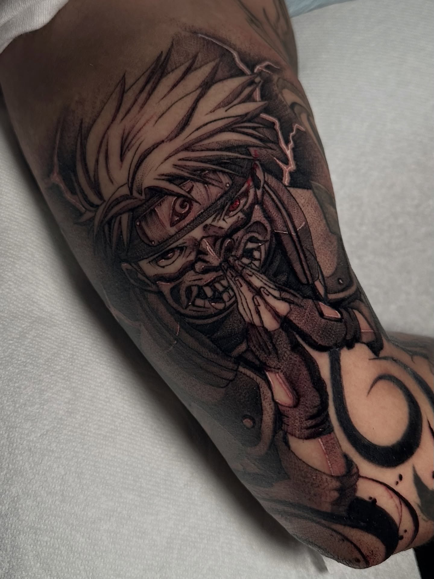 Anime character anime tattoo on the forearm by Crystal, Las Vegas, Nevada
