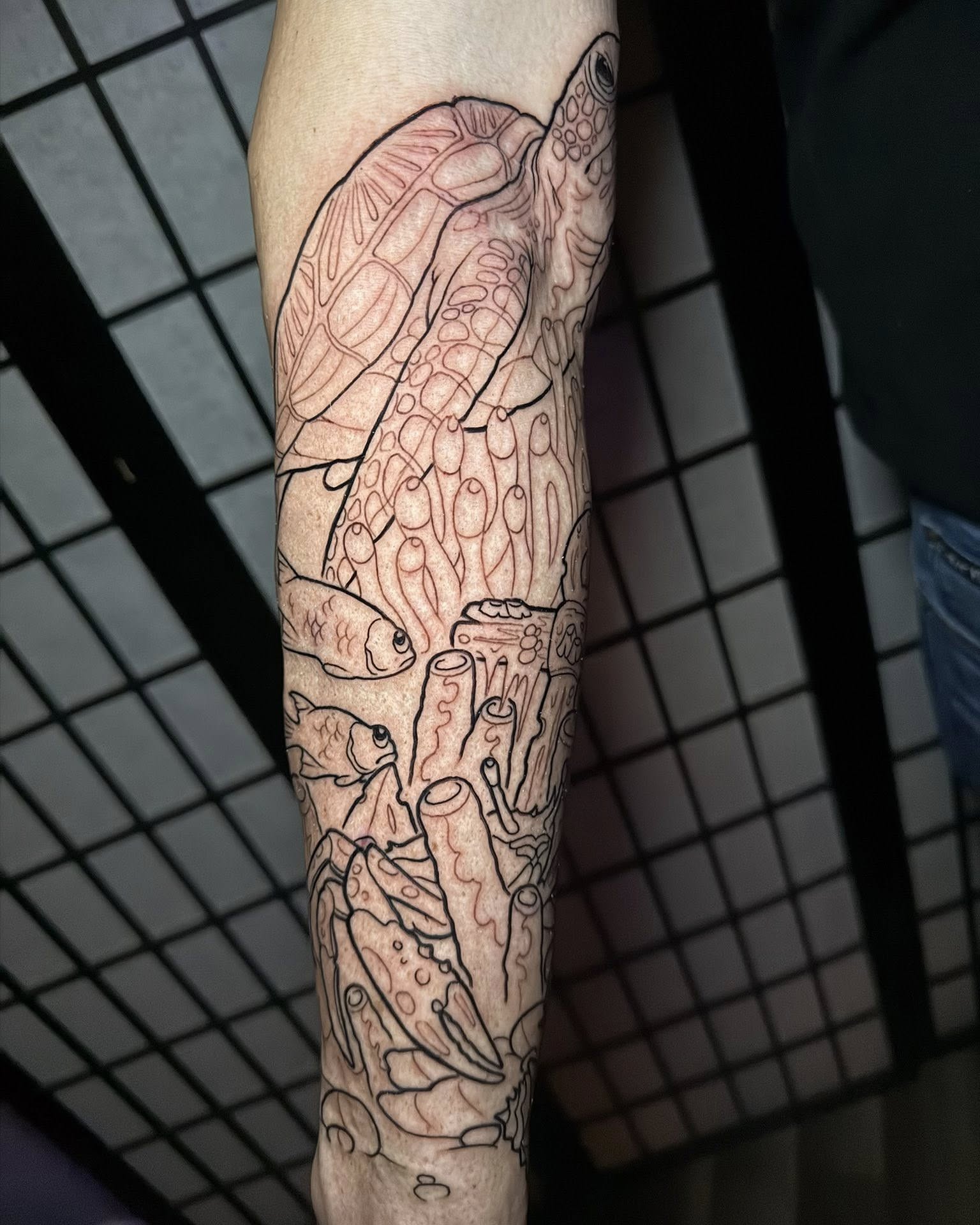 Underwater scene realism tattoo on the forearm by taylor mills