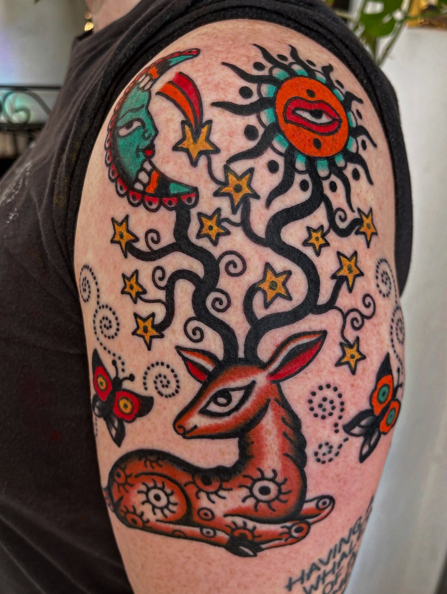 Deer and celestial elements American traditional tattoo on the shoulder by Swasthik Iyengar, New York, New York