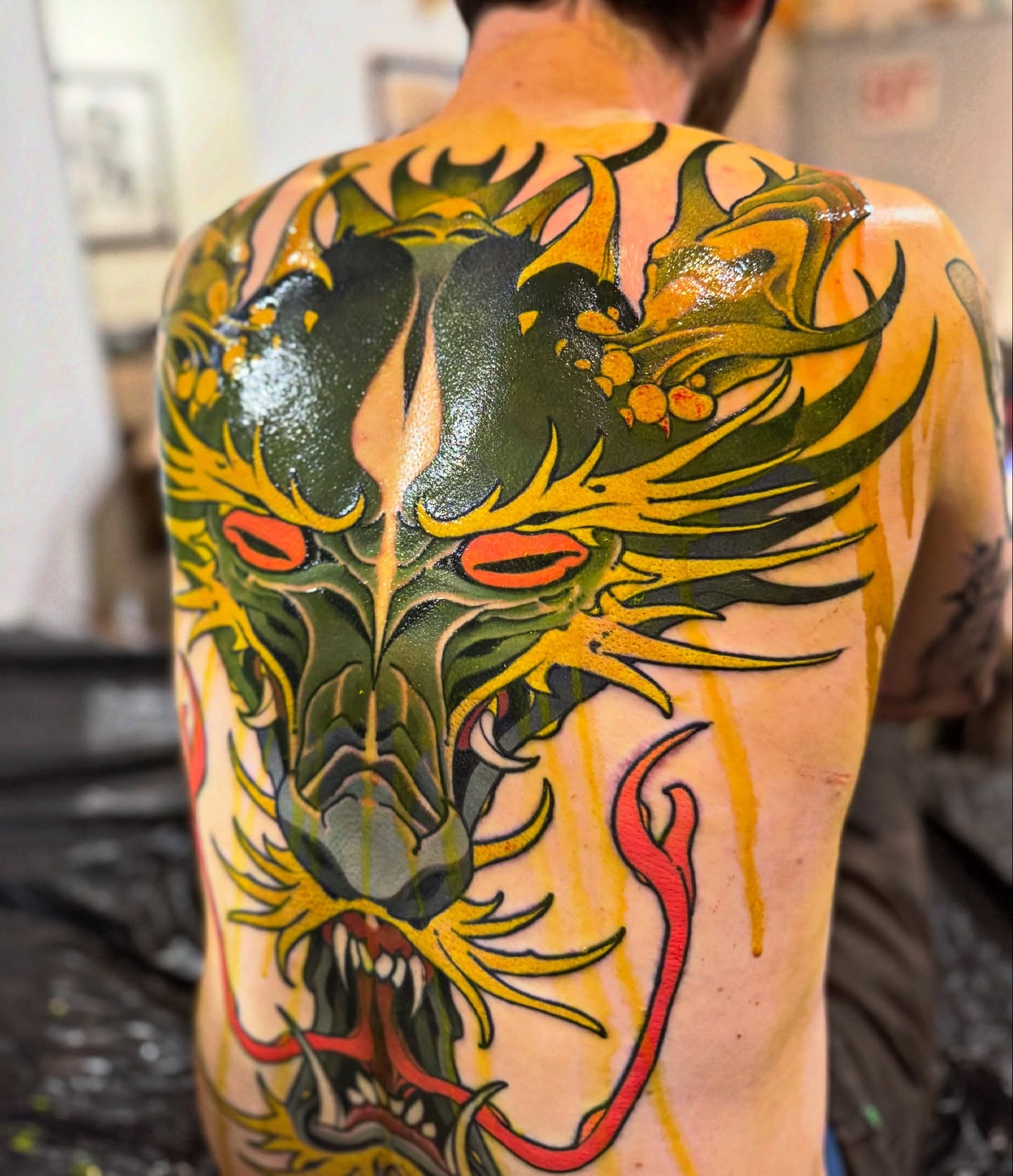 Dragon American traditional tattoo on the back by Emmanuel Mendoza