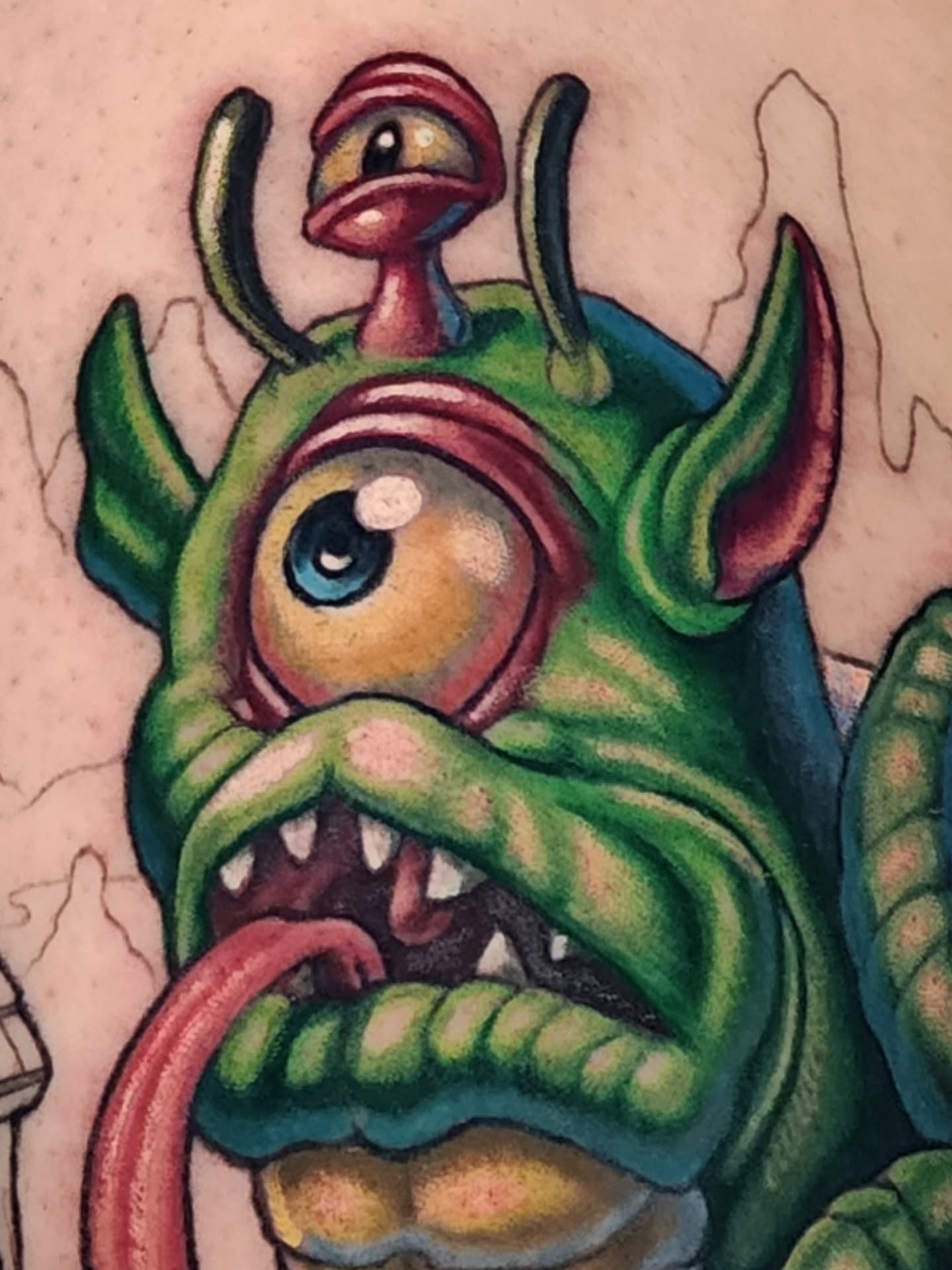 Alien creature American traditional tattoo on the forearm by Chicago Tattoo Artist New School Tattoos, Naperville, Illinois
