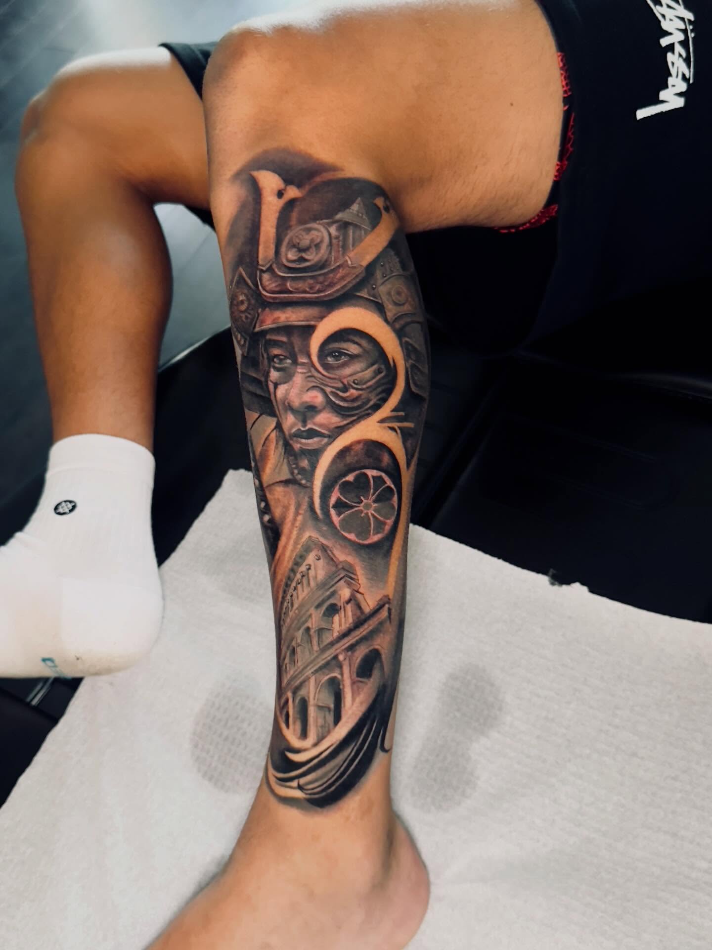 Ancient warrior realism tattoo on the calf by Levi Tattoo Artist, Utah