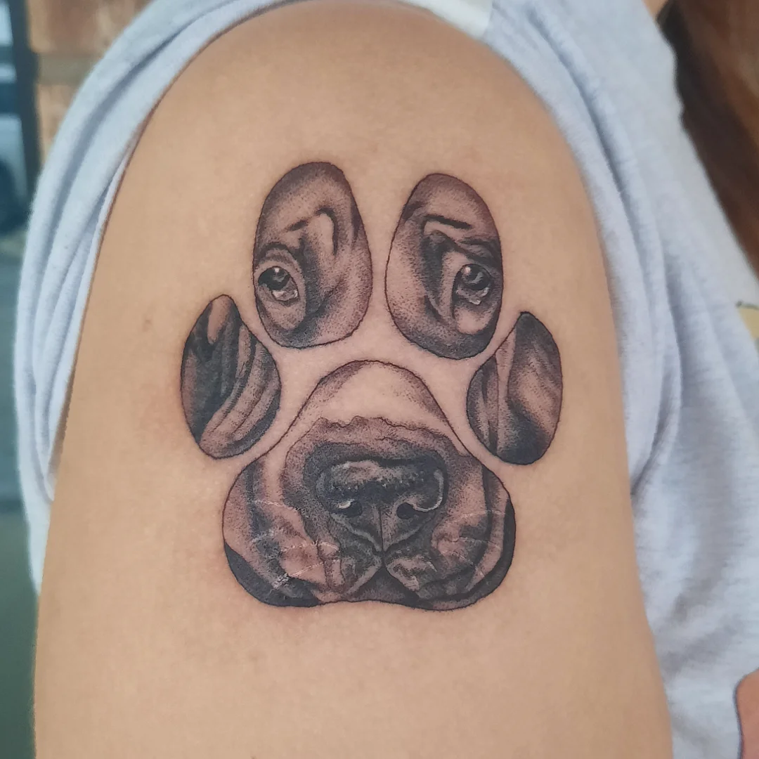 Dog face realism tattoo on the shoulder by Kaetlyn