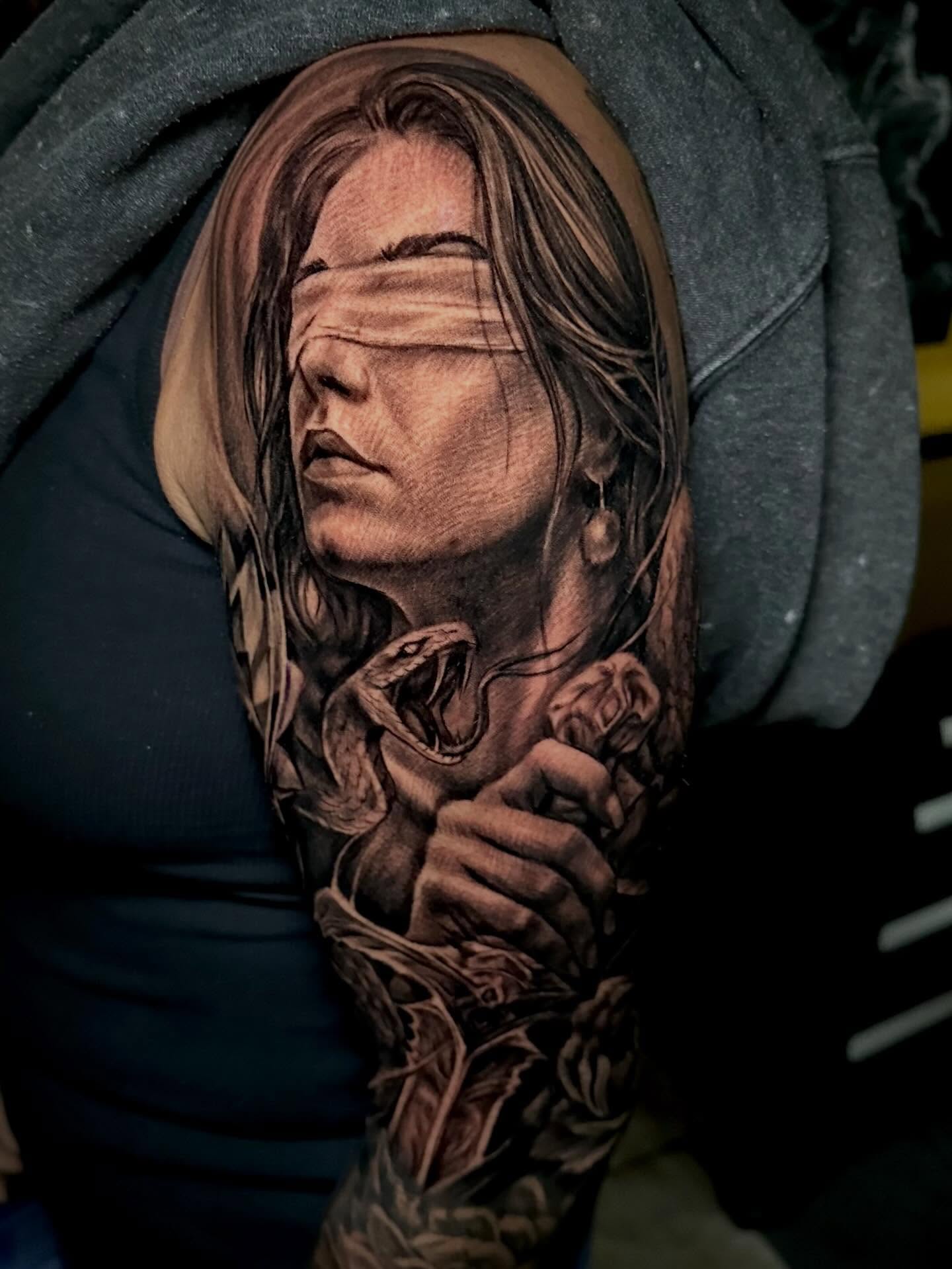Woman realism tattoo on the forearm by Comfy Chris Fettig
