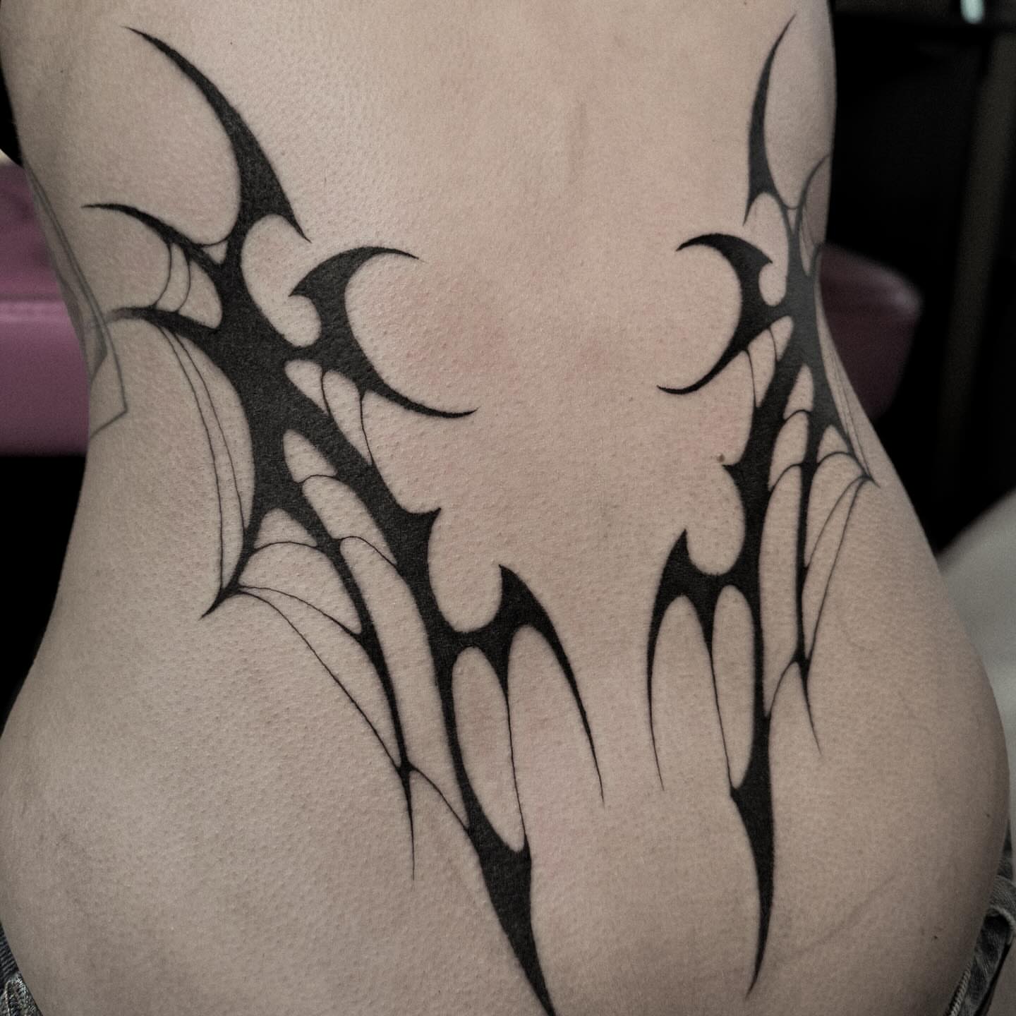 Tribal design tribal tattoo on the torso by La Hyene