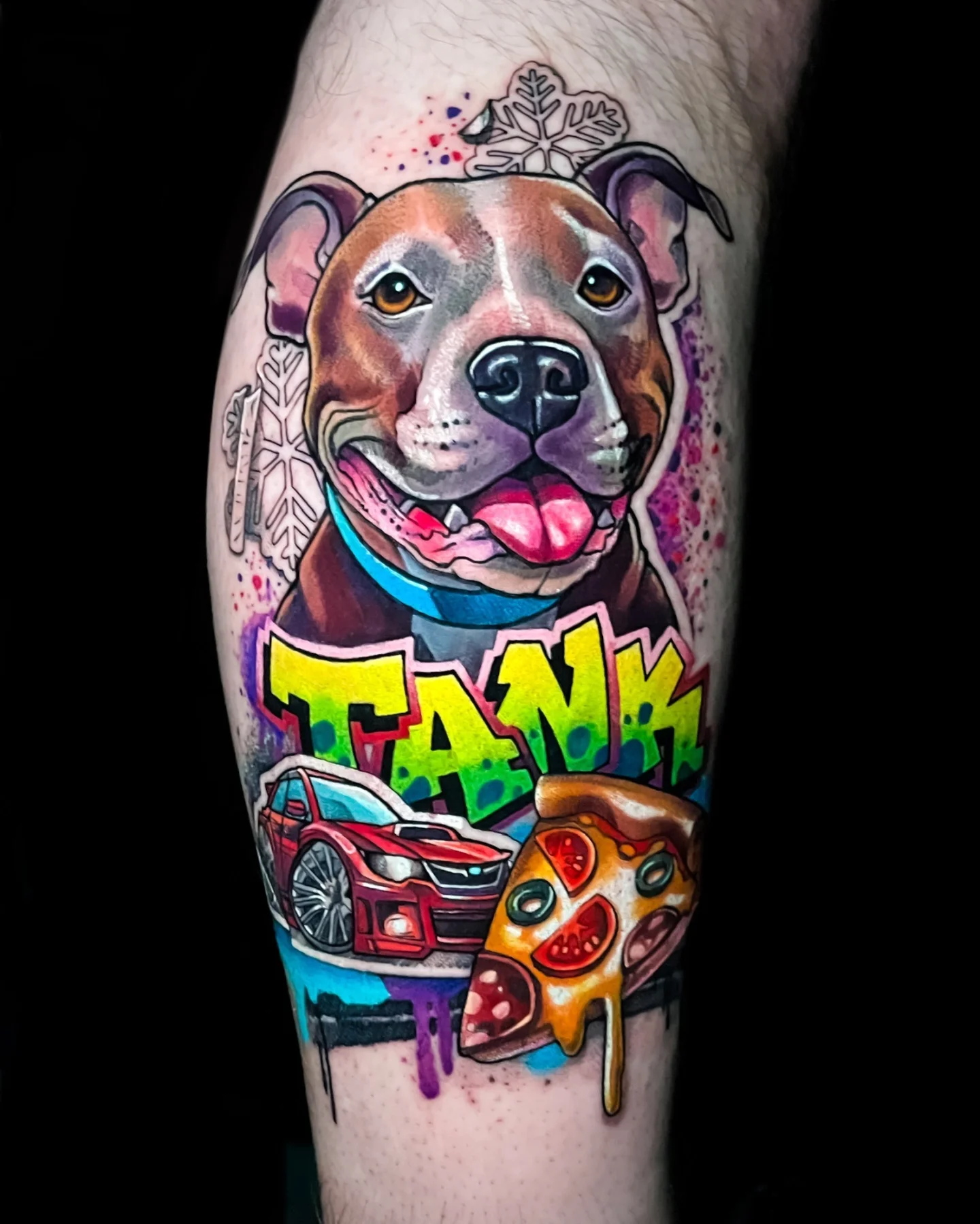 Dog with pizza and car realism tattoo on the forearm by Tattoo artist in Seattle, WA
