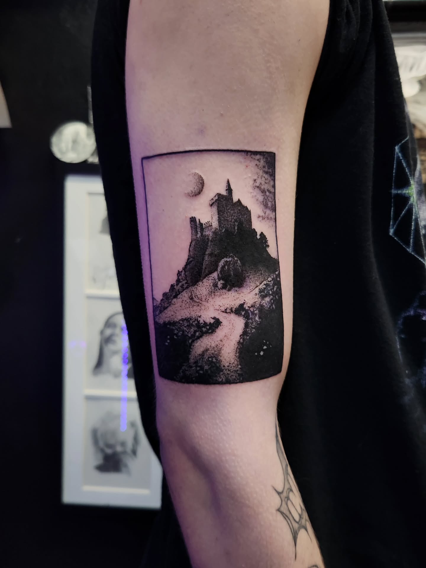 Castle on hill dotwork tattoo on the forearm by Adrian Chavez