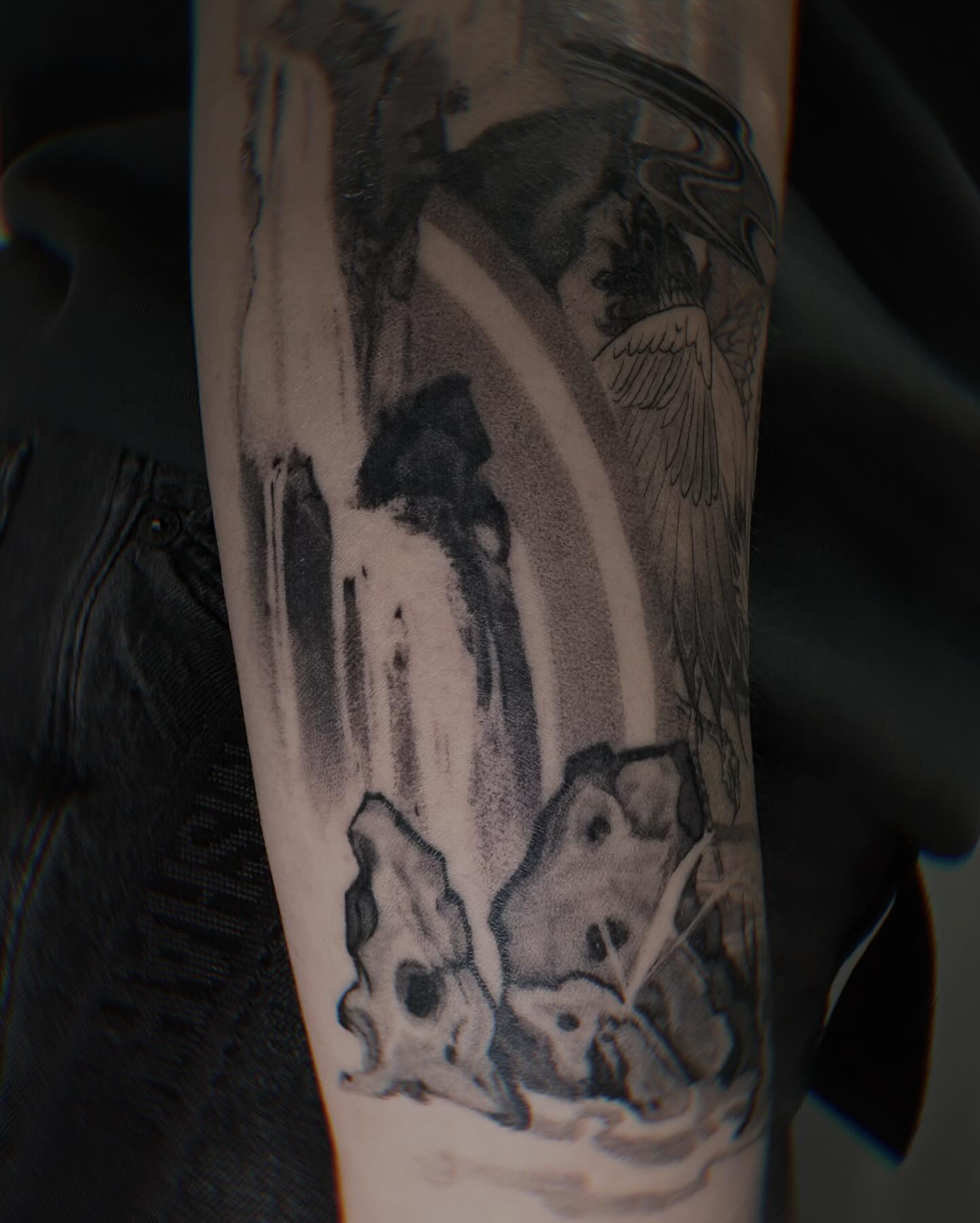 Waterfall black and grey tattoo on the forearm by Yu Chen