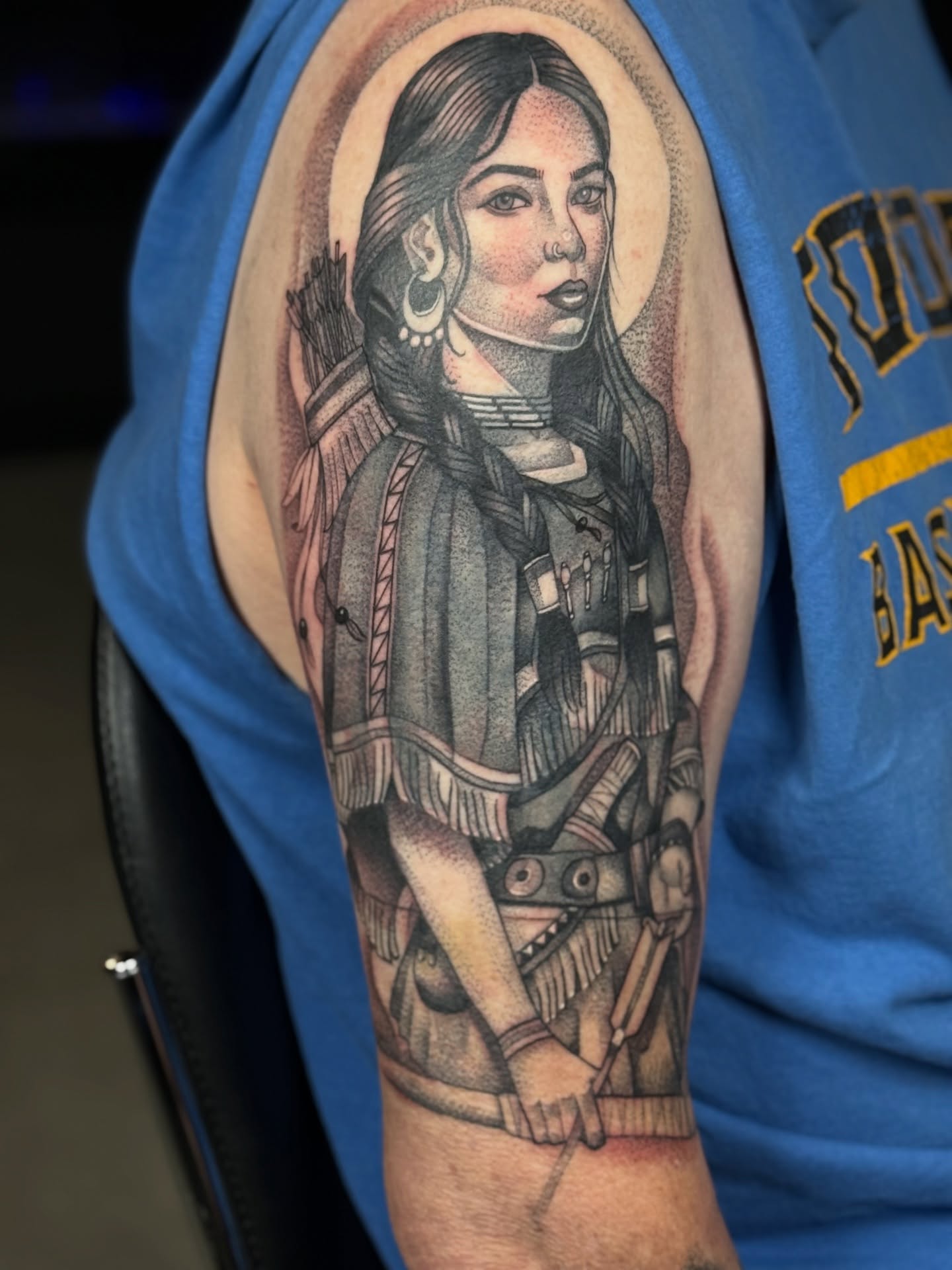 Indigenous woman American traditional tattoo on the shoulder by Miles Romero Smith