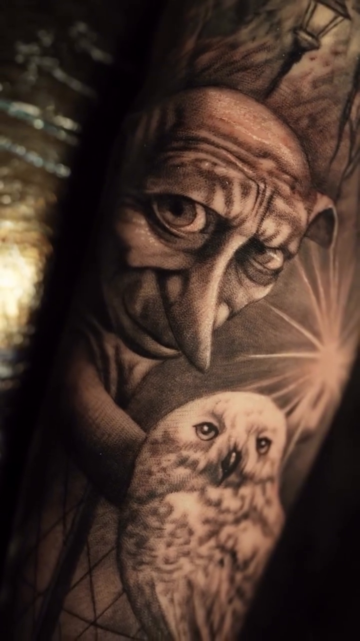 Dobby and owl with castle realism tattoo by Daniela Pusateri