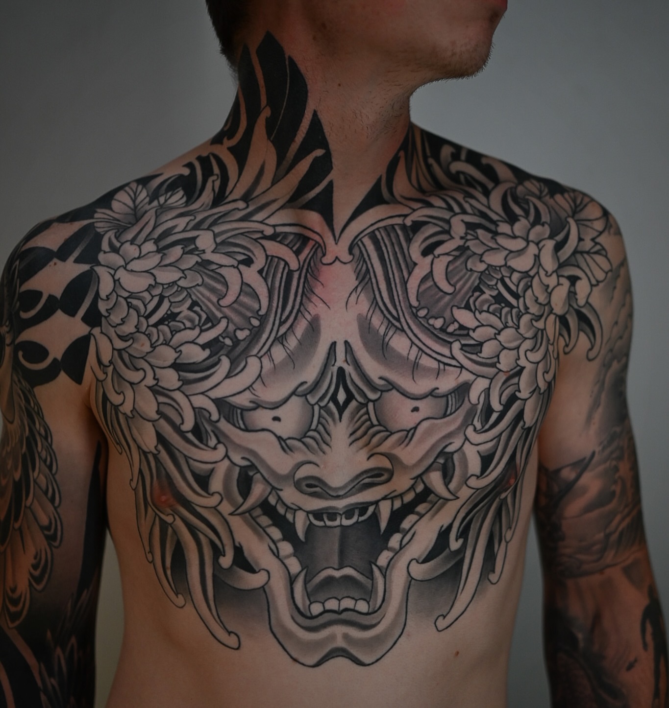 Lion japanese irezumi tattoo on the chest by Ryan Spencer - San Diego Tattoo Artist