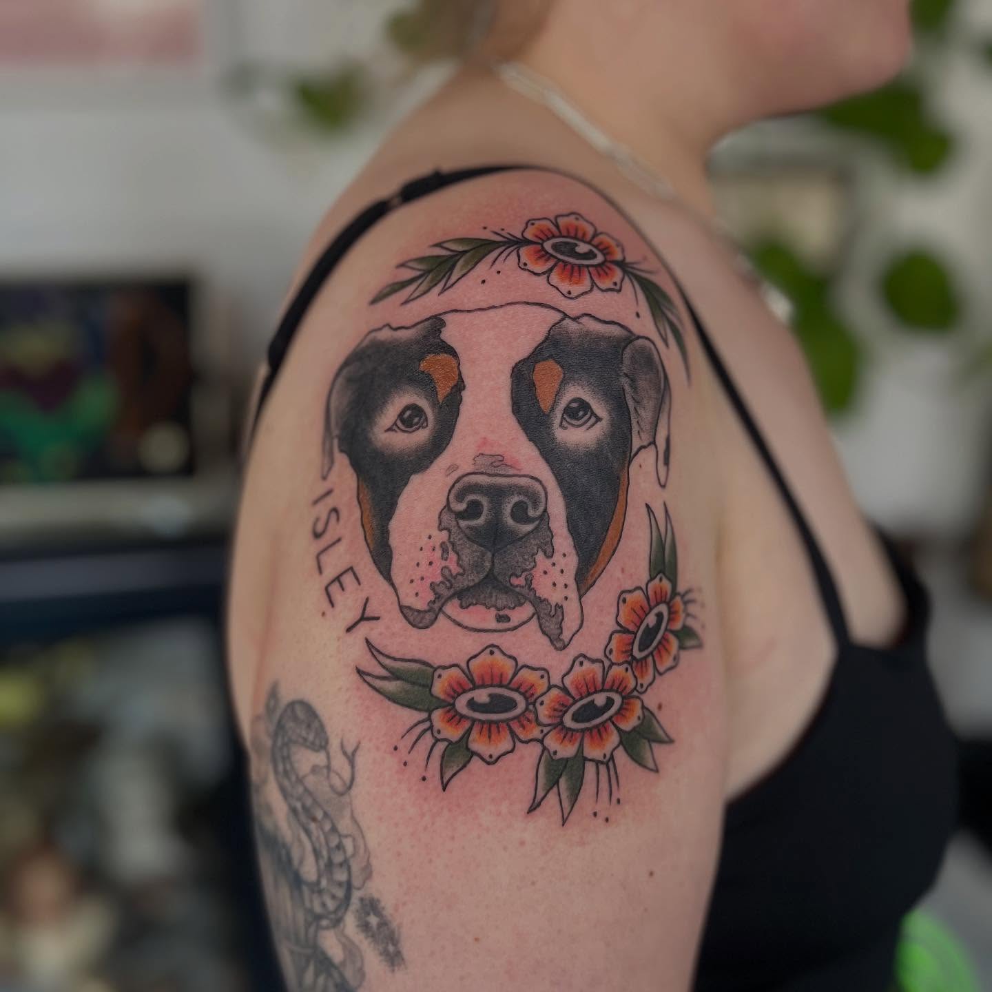 Dog portrait realism tattoo on the shoulder by Maddy Anthony