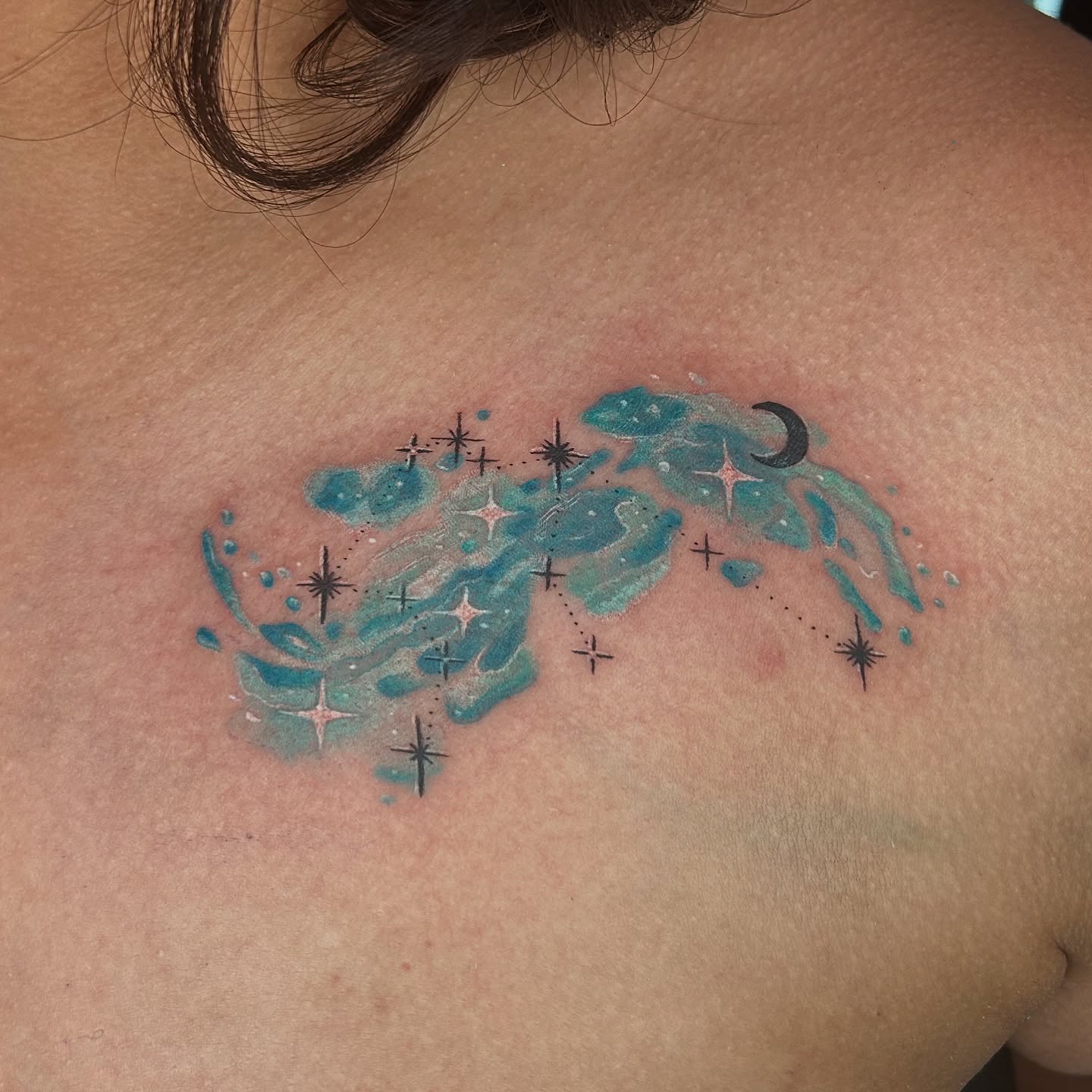 Constellation dotwork tattoo on the back by Mallory