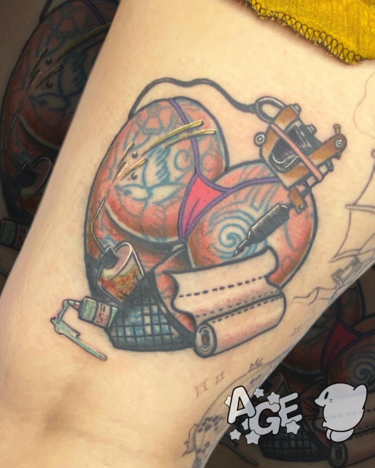 Woman with tattoo gun American traditional tattoo on the thigh by Otaku and Gamer Tattooer
