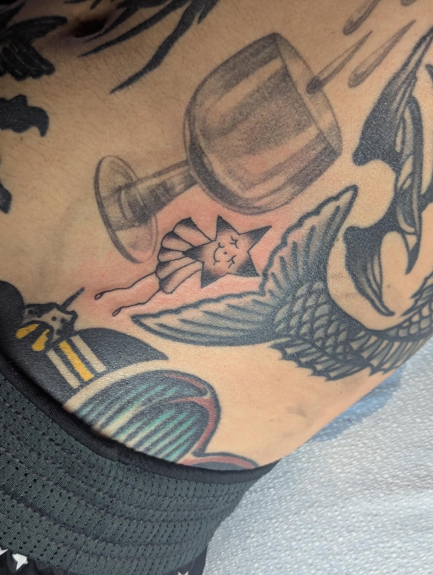 Mermaid and wine glass American traditional tattoo on the torso by G. Clover ⚧︎, Chicago, Illinois