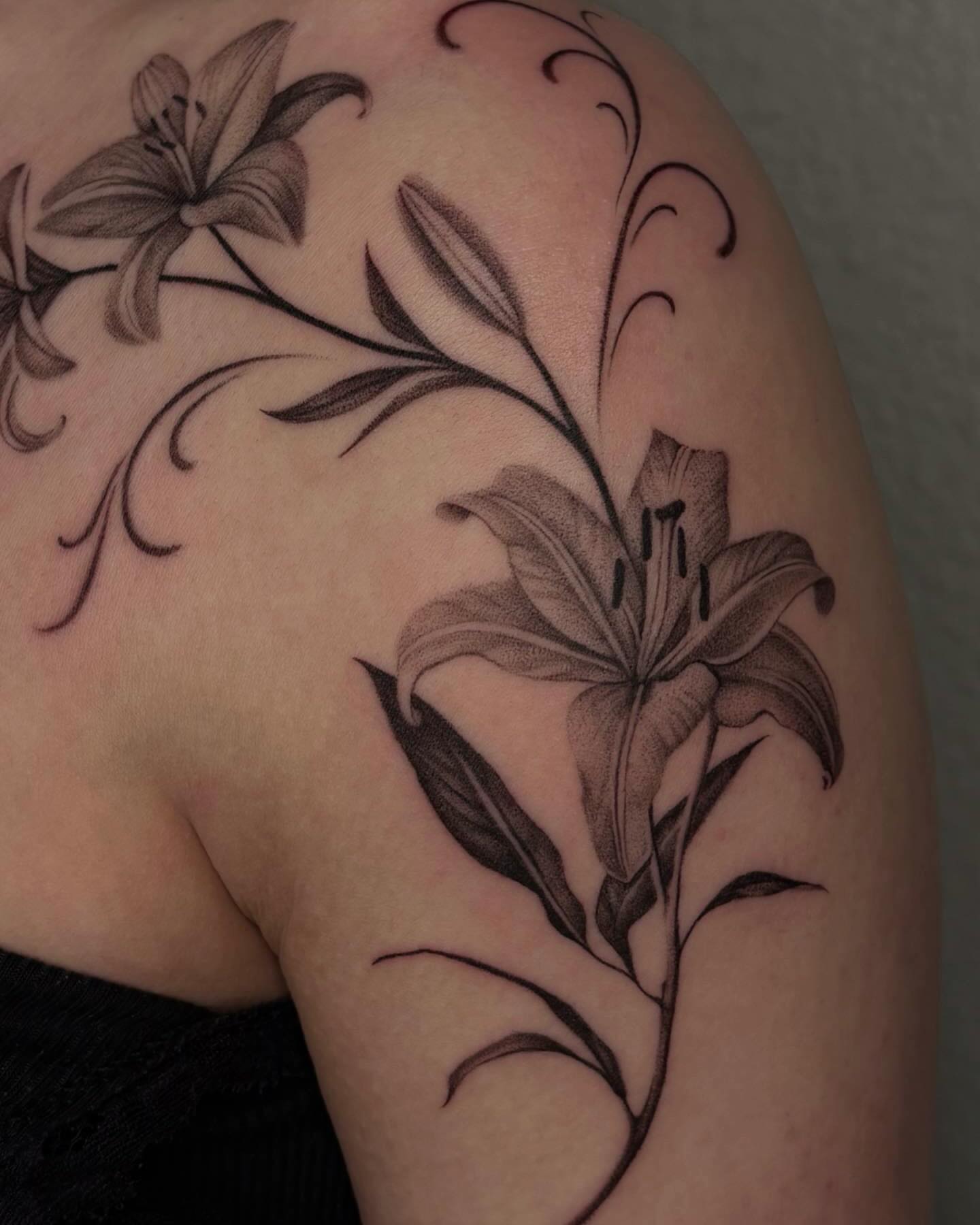 Lily black and grey tattoo on the shoulder by Nayoung, San Francisco, California