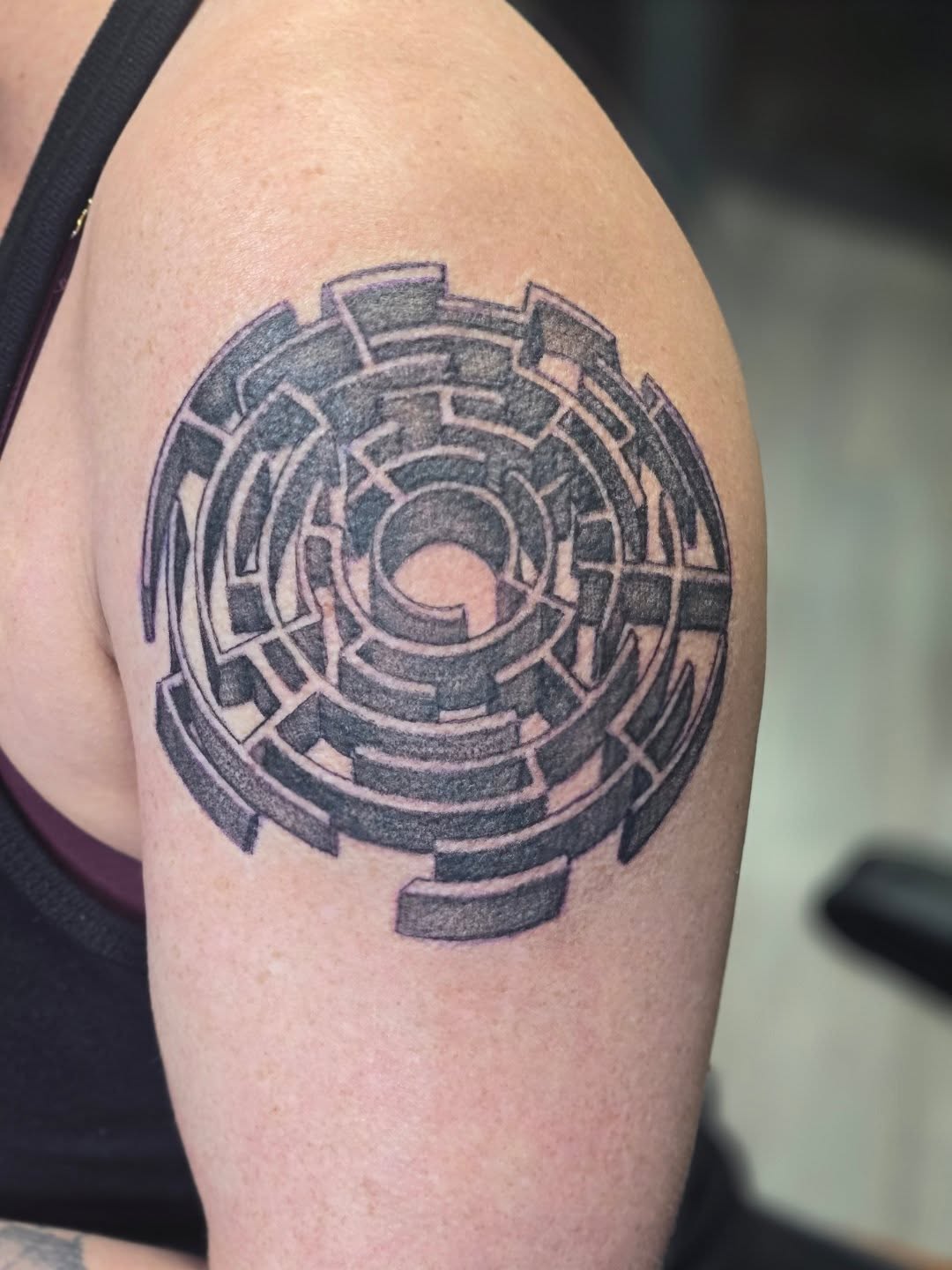 Geometric maze geometric tattoo on the shoulder by Karen Cain