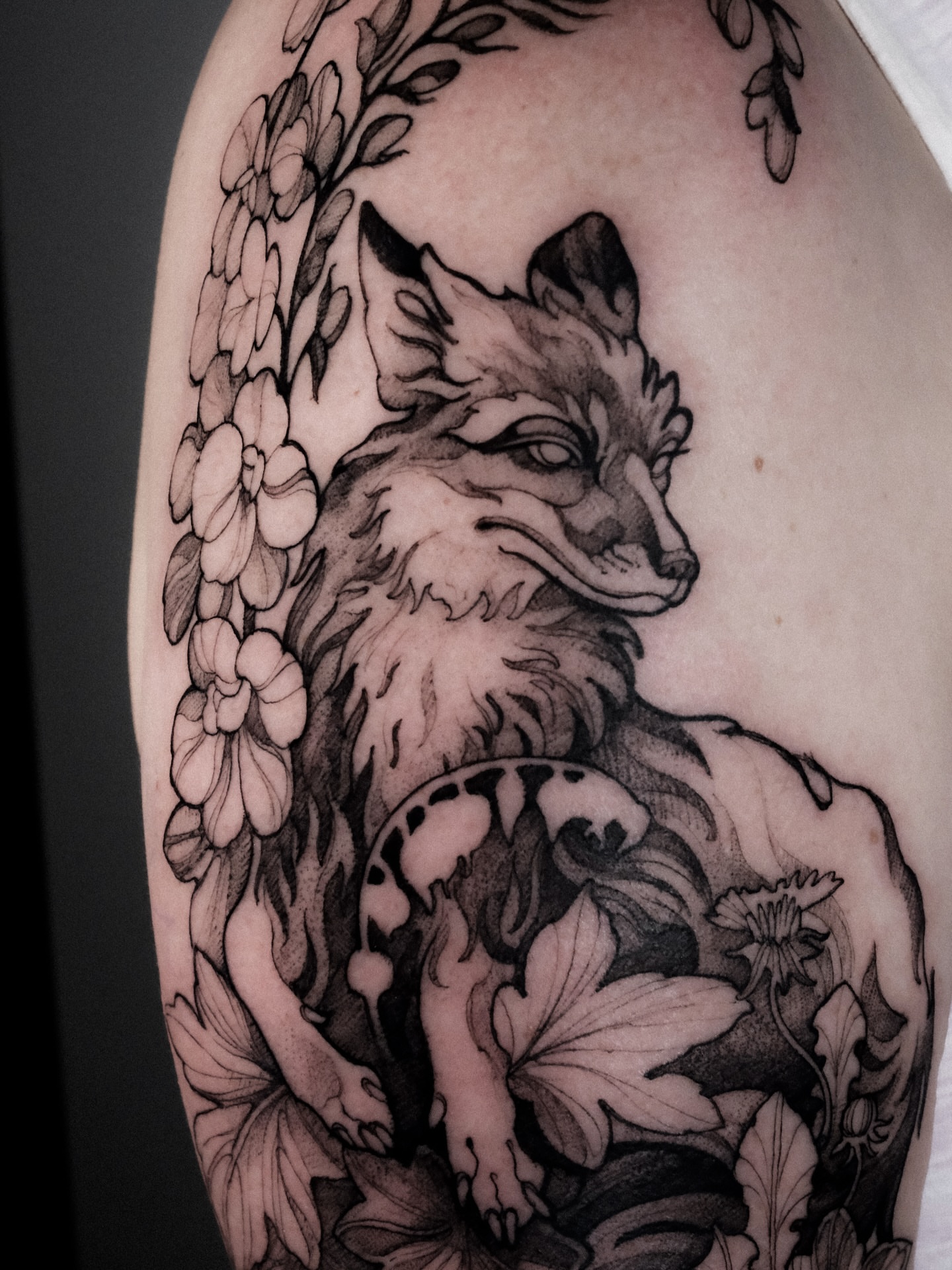 Fox and flowers realism tattoo on the shoulder by Alena Zozulenko