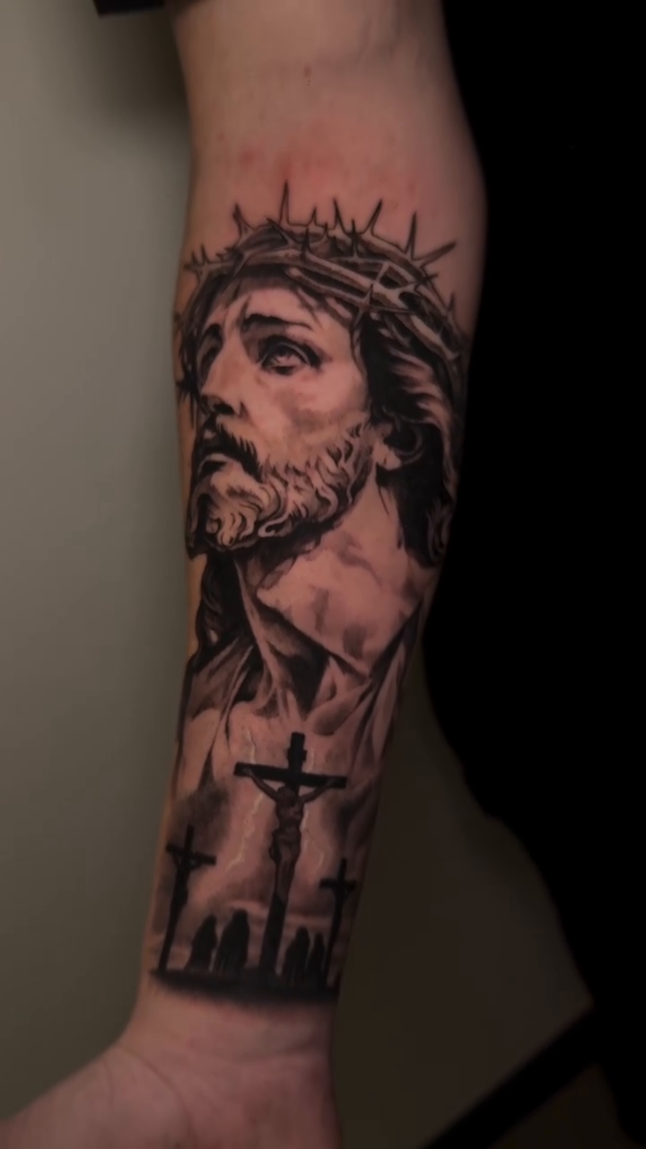 Jesus christ and crown of thorns realism tattoo by Neo-Traditional tattoos in Las Vegas
