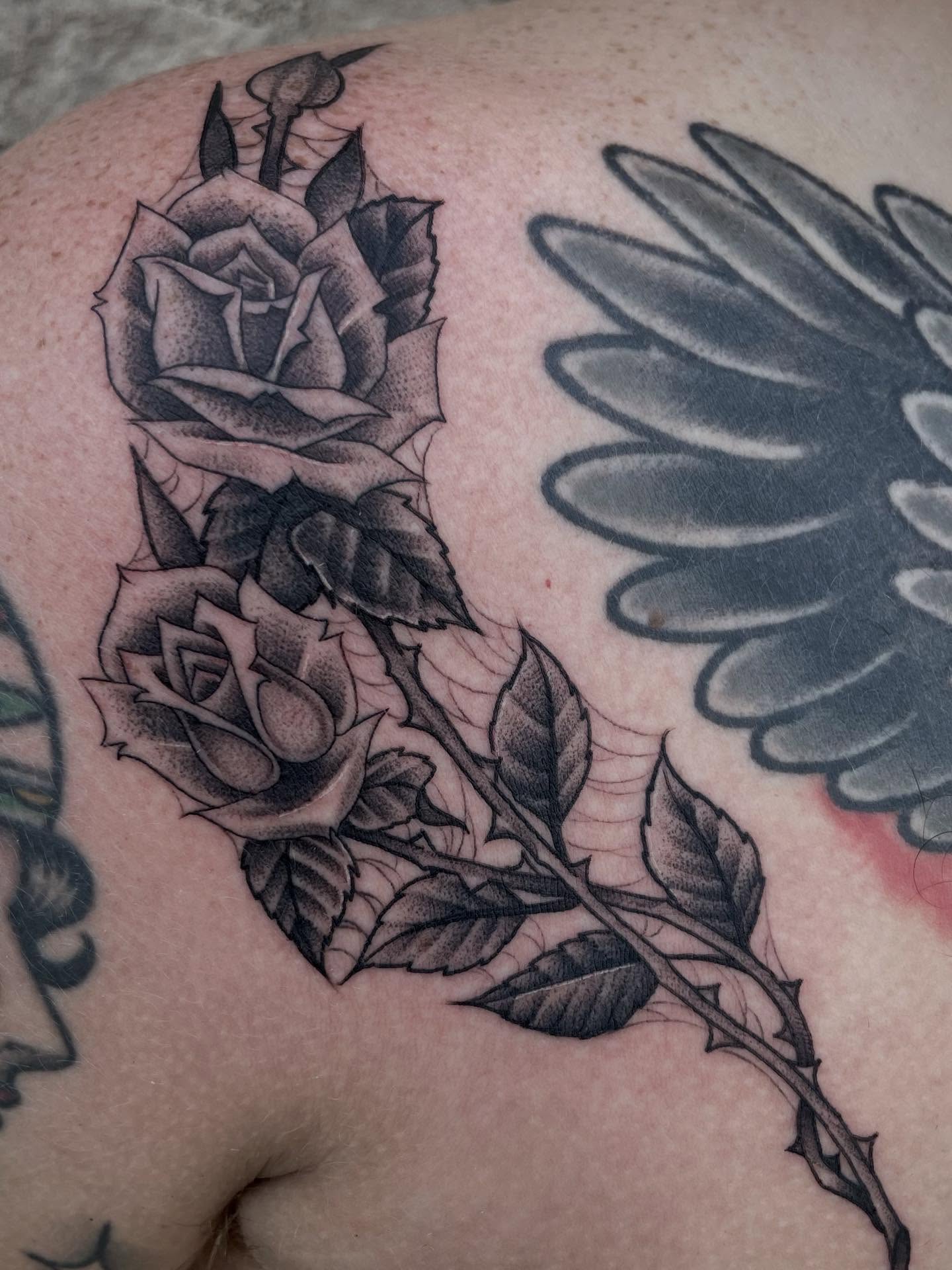 Rose black and grey tattoo on the shoulder by Micheal McGlinchey