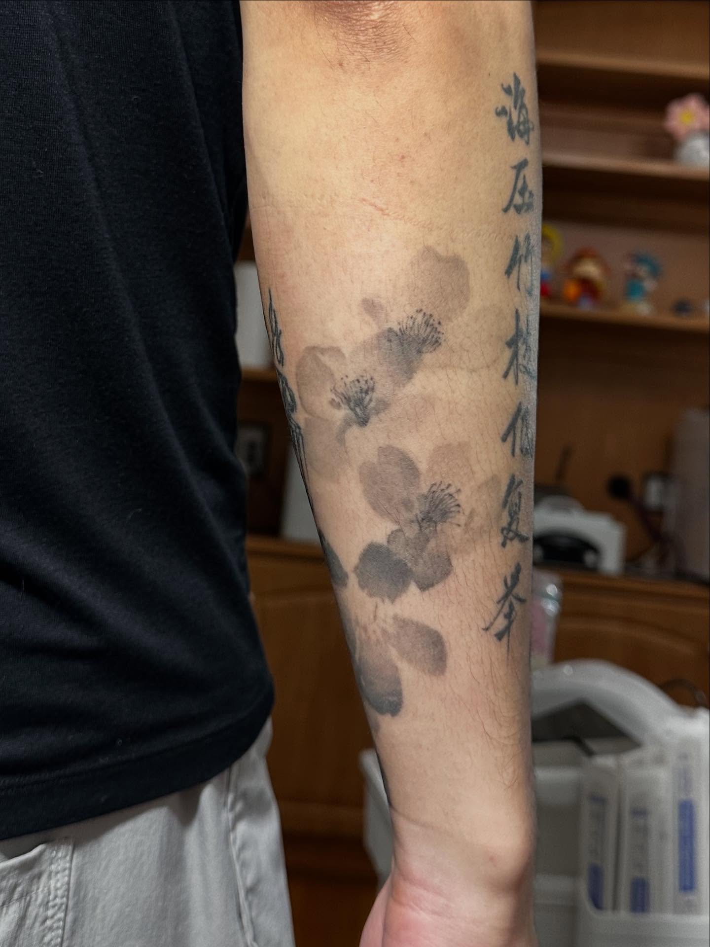 Cherry blossoms black and grey tattoo on the forearm by Tomato
