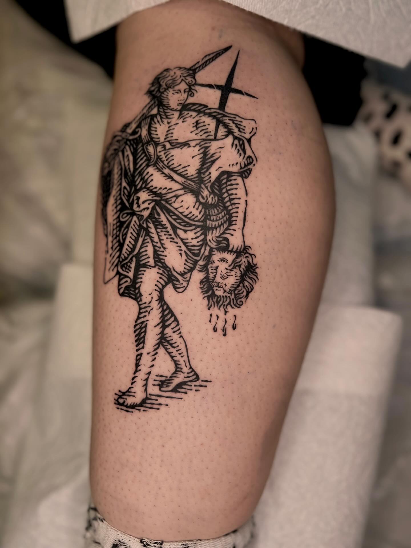 St. george slaying dragon black and grey tattoo on the thigh by Wonny