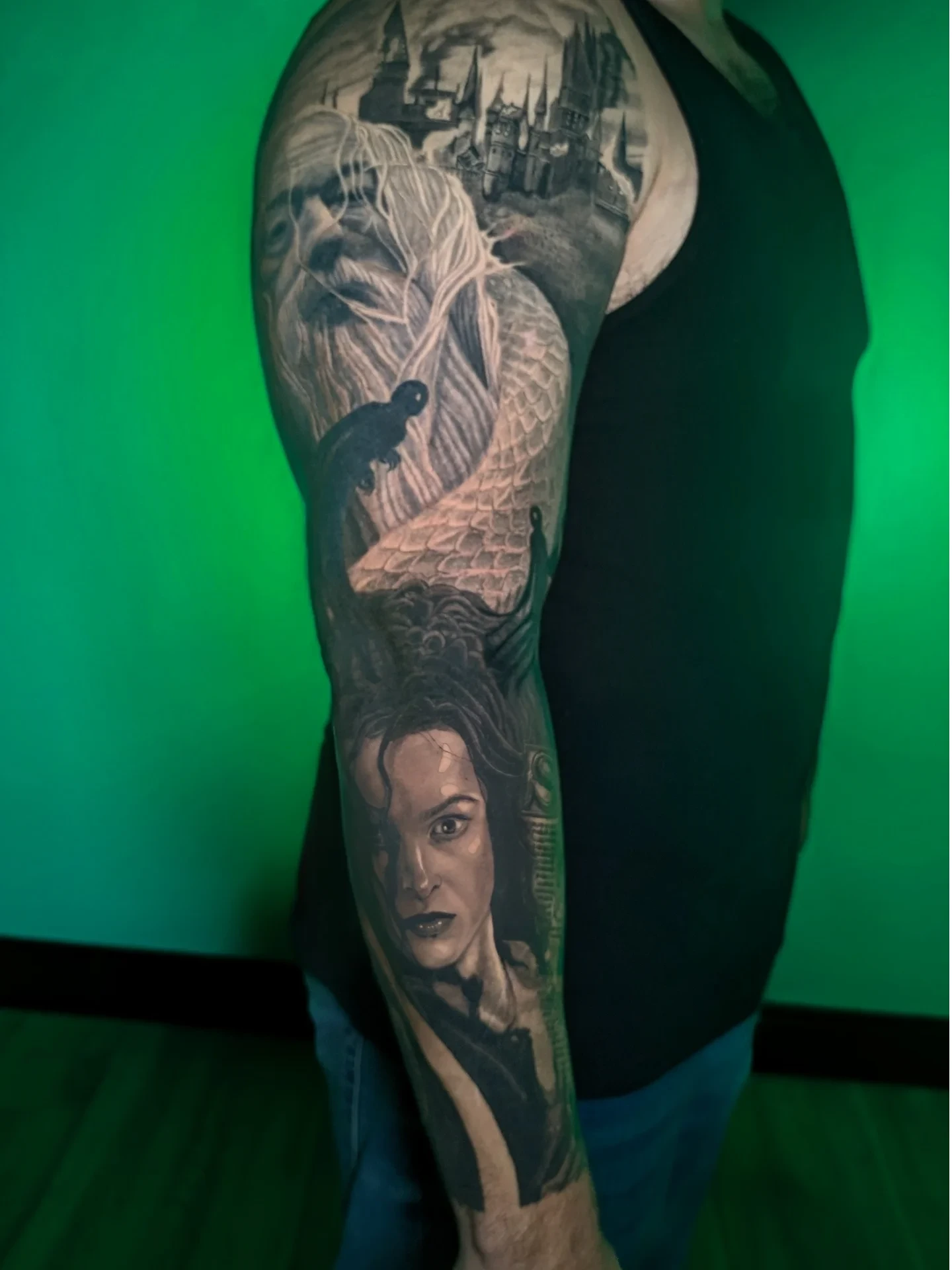 Mermaid and castle realism tattoo on the forearm by Antonio Arias