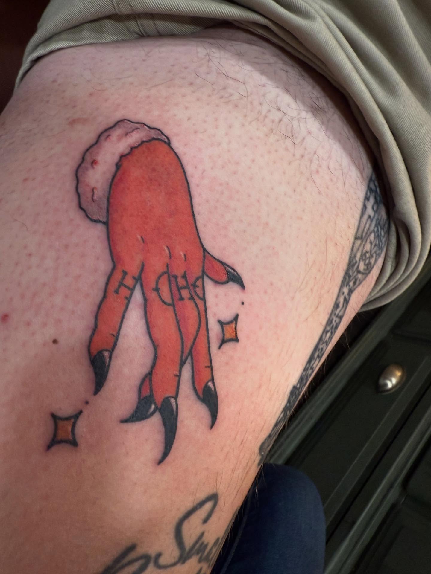 Octopus tentacle American traditional tattoo on the thigh by Brandie Caroline, Somers Point, New Jersey