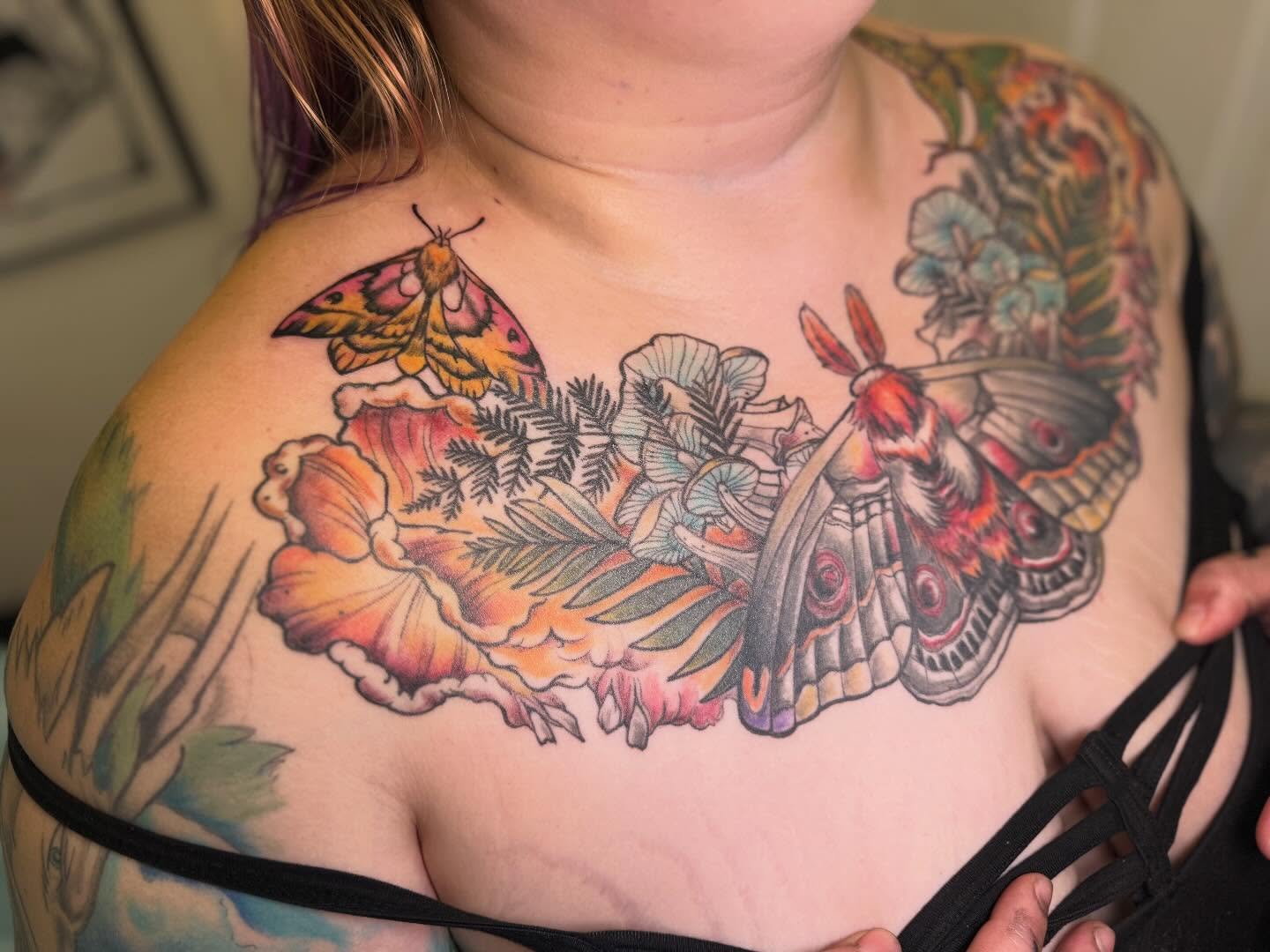 Butterflies and flowers new school tattoo on the chest by Vega