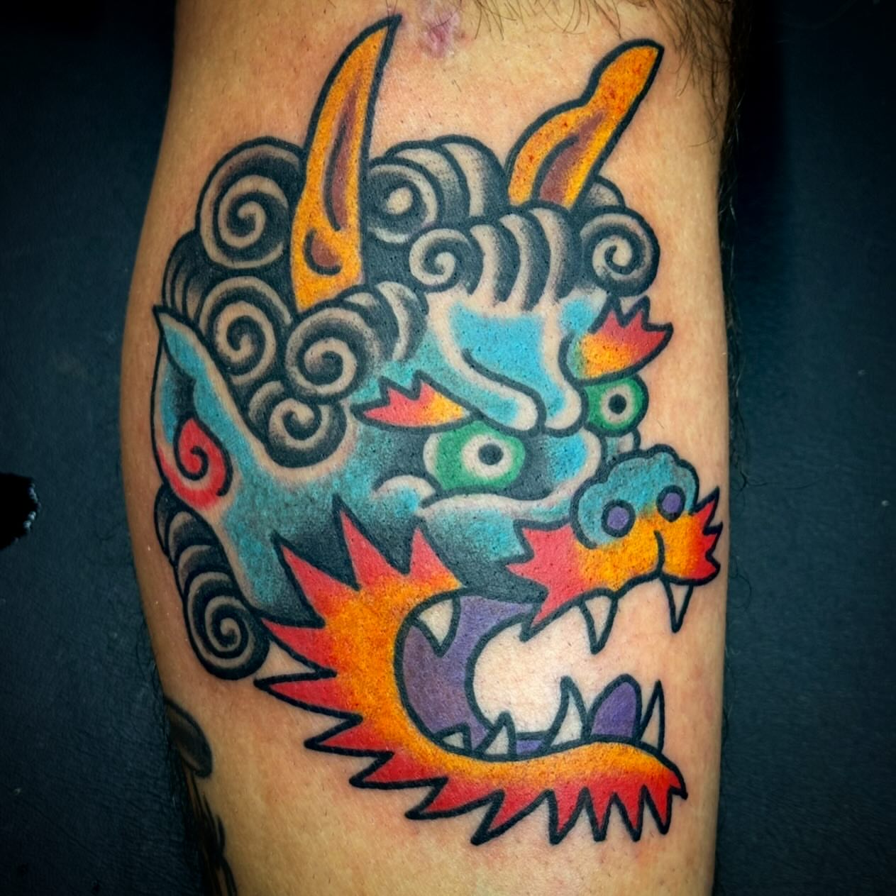 Dragon American traditional tattoo on the forearm by Sam Hambrick, Watchung NJ