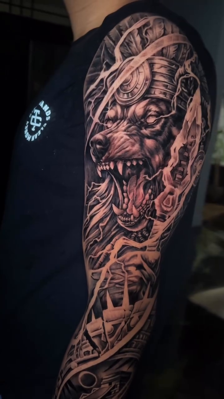 Creature and geometric patterns dark realism tattoo by 𝐉𝐨𝐧 𝐒𝐚𝐧𝐭𝐨𝐬